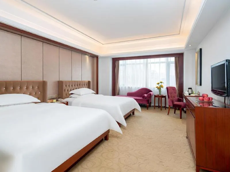 Bed in Vienna Hotel Dongguan Humen Wanda Plaza