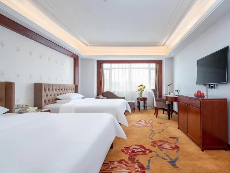 Bed in Vienna Hotel Dongguan Humen Wanda Plaza