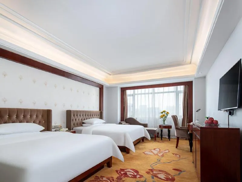Bed in Vienna Hotel Dongguan Humen Wanda Plaza
