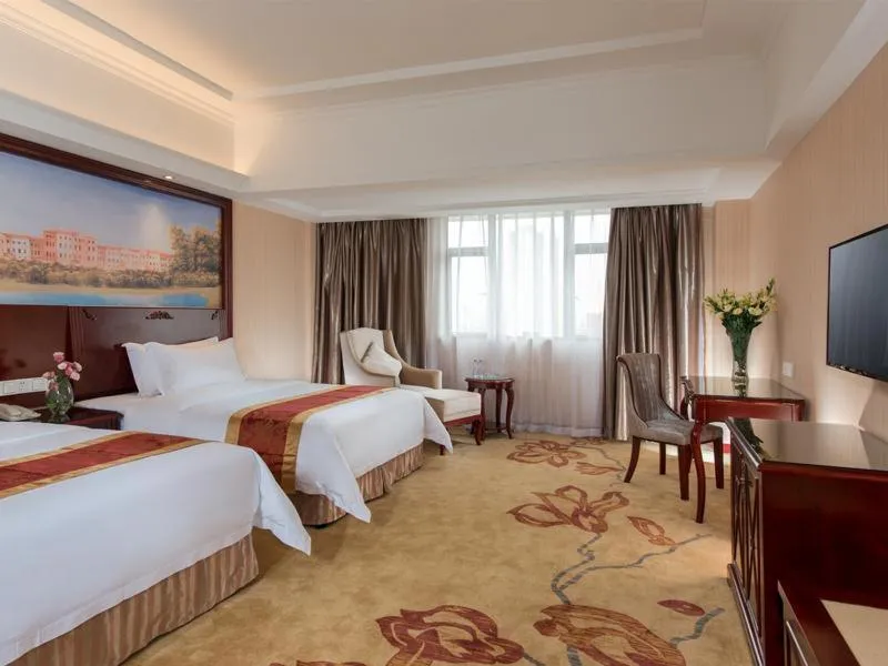 Bed in Vienna Hotel Foshan Nanhai City Square