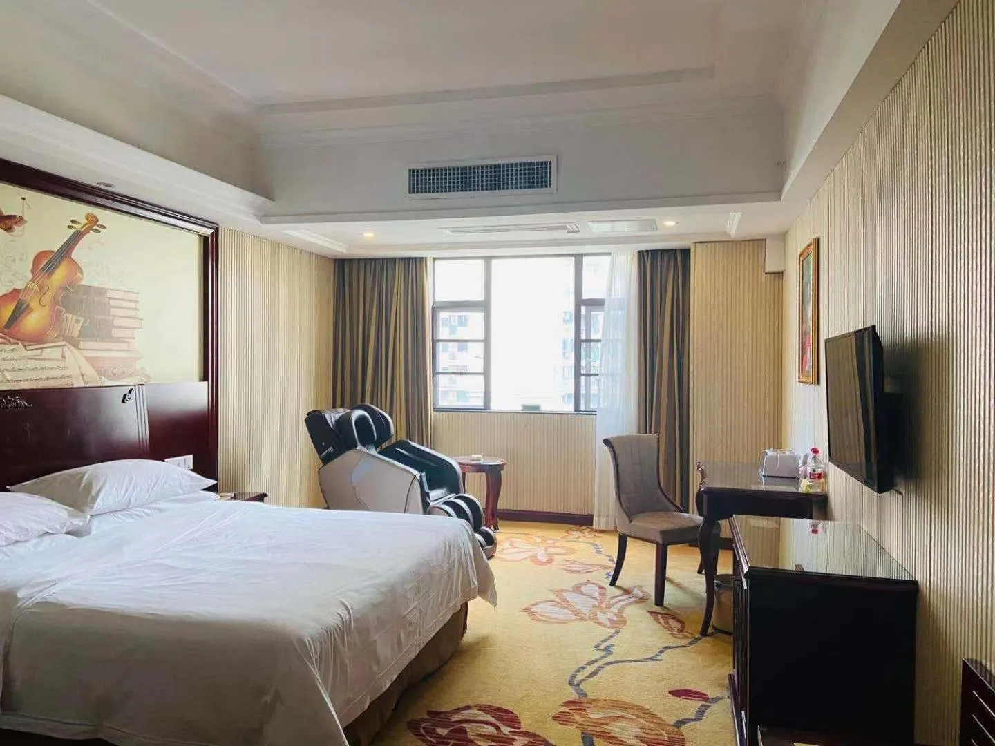 Bed in Vienna Hotel Foshan Nanhai City Square