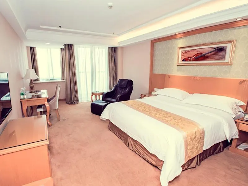 Bed in Vienna Hotel Rugao Zhengxiang Square