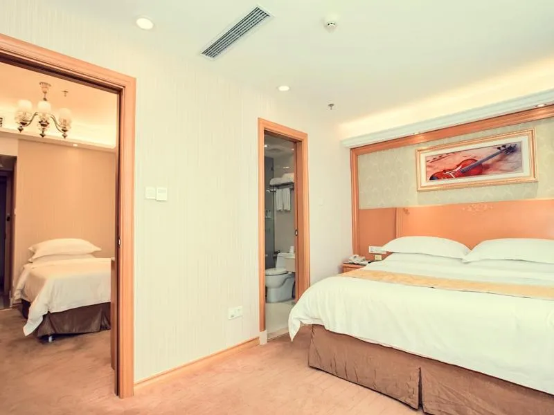 Bed in Vienna Hotel Rugao Zhengxiang Square