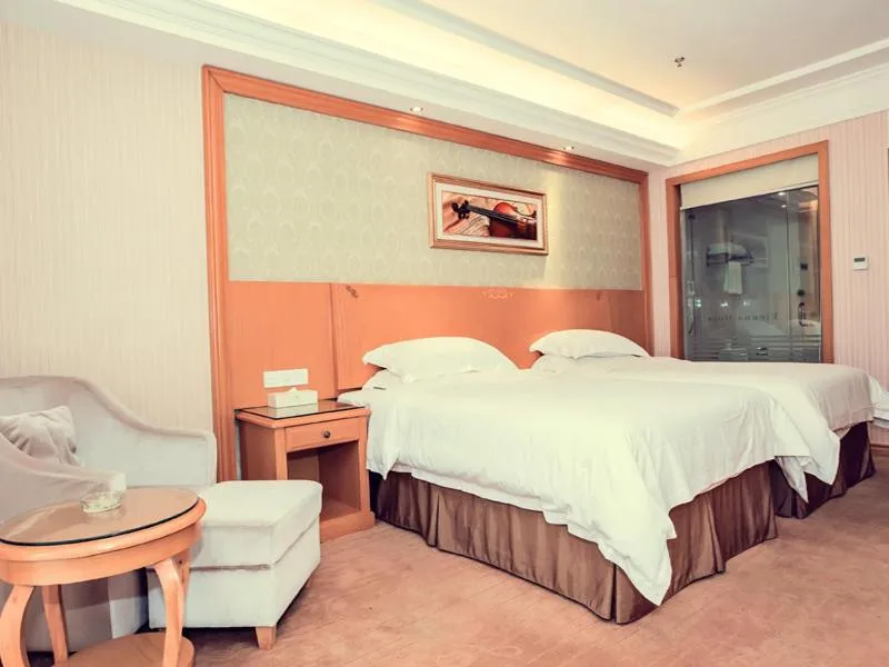 Bed in Vienna Hotel Rugao Zhengxiang Square