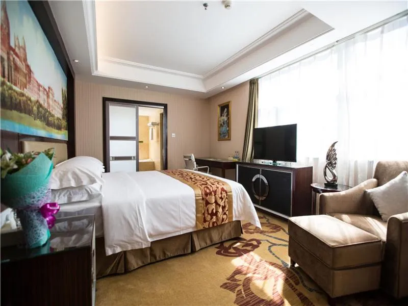 Bed in Vienna Hotel Zhumadian Huayuan Xuefu