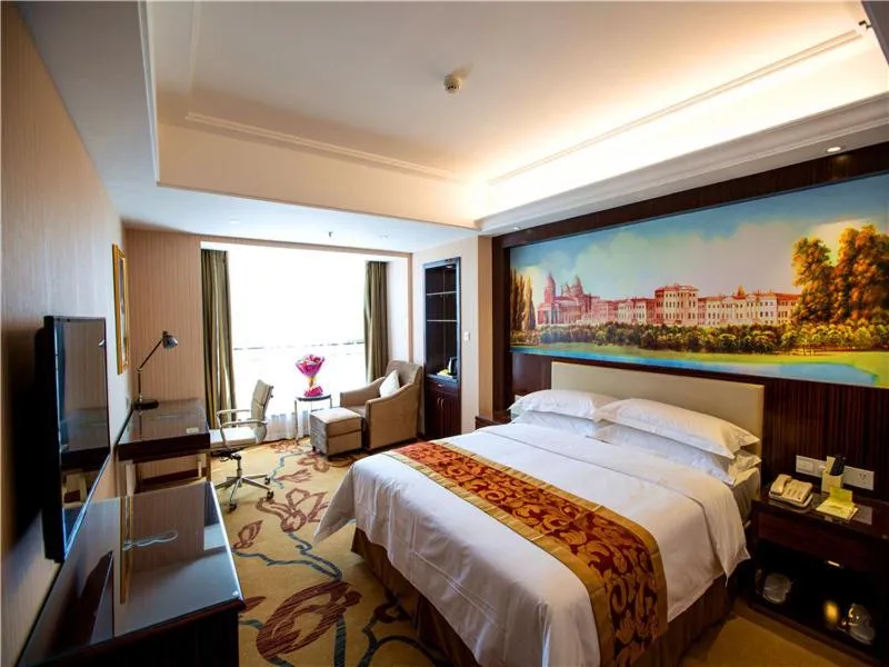 Bed in Vienna Hotel Zhumadian Huayuan Xuefu