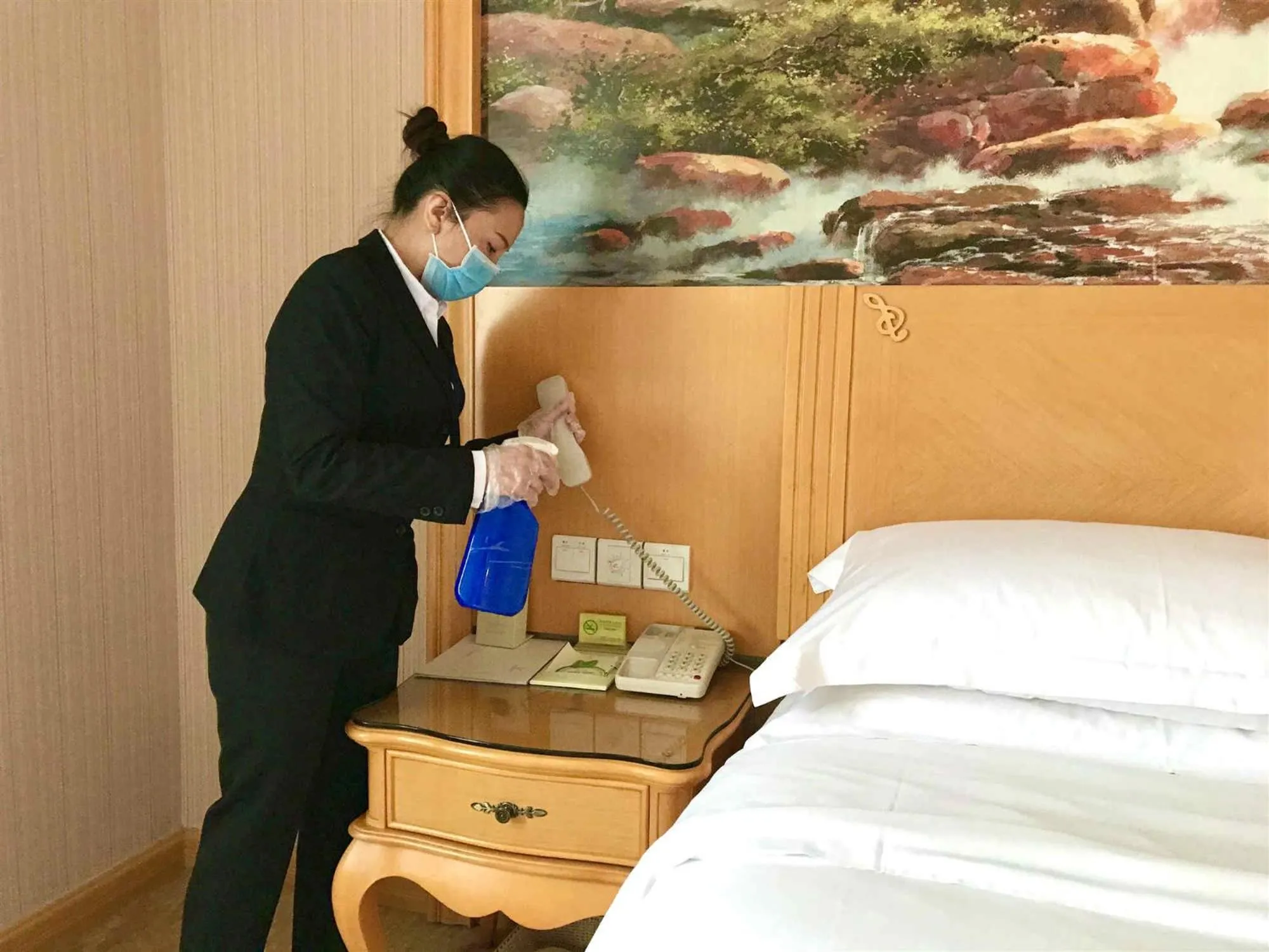 Bed in Vienna International Hotel Shenzhen Guangming Avenue