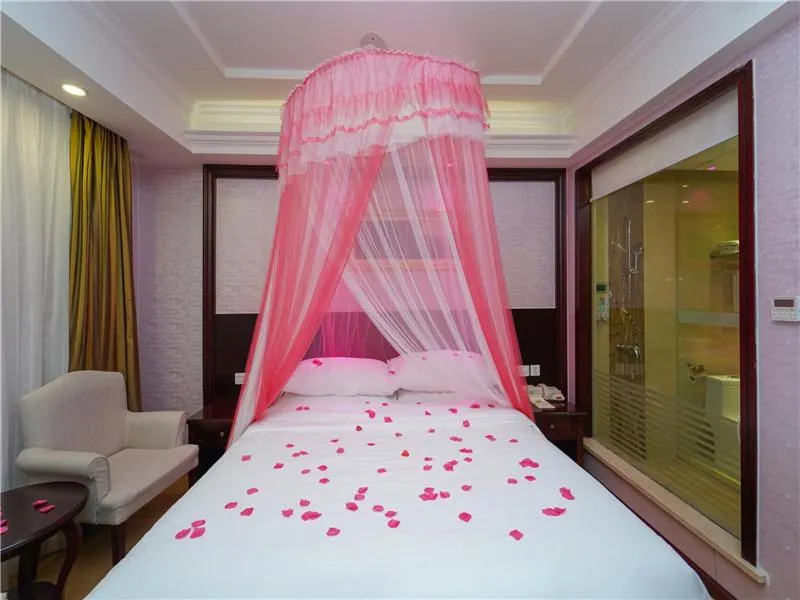 Bed in Vienna Hotel Shanghai Pudong Jinqiao Park