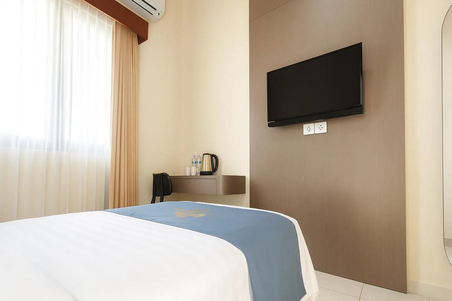 Bed in Ciptaningati Culture Hotel Batu