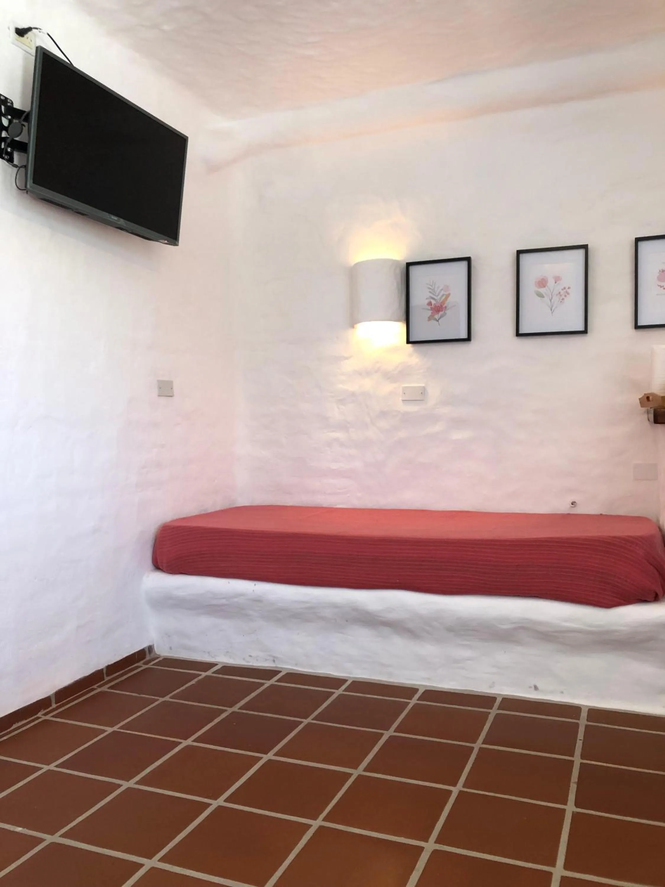 Bed in El Faro de Carpier - ApartHotel & Restaurante Bar Cafetería