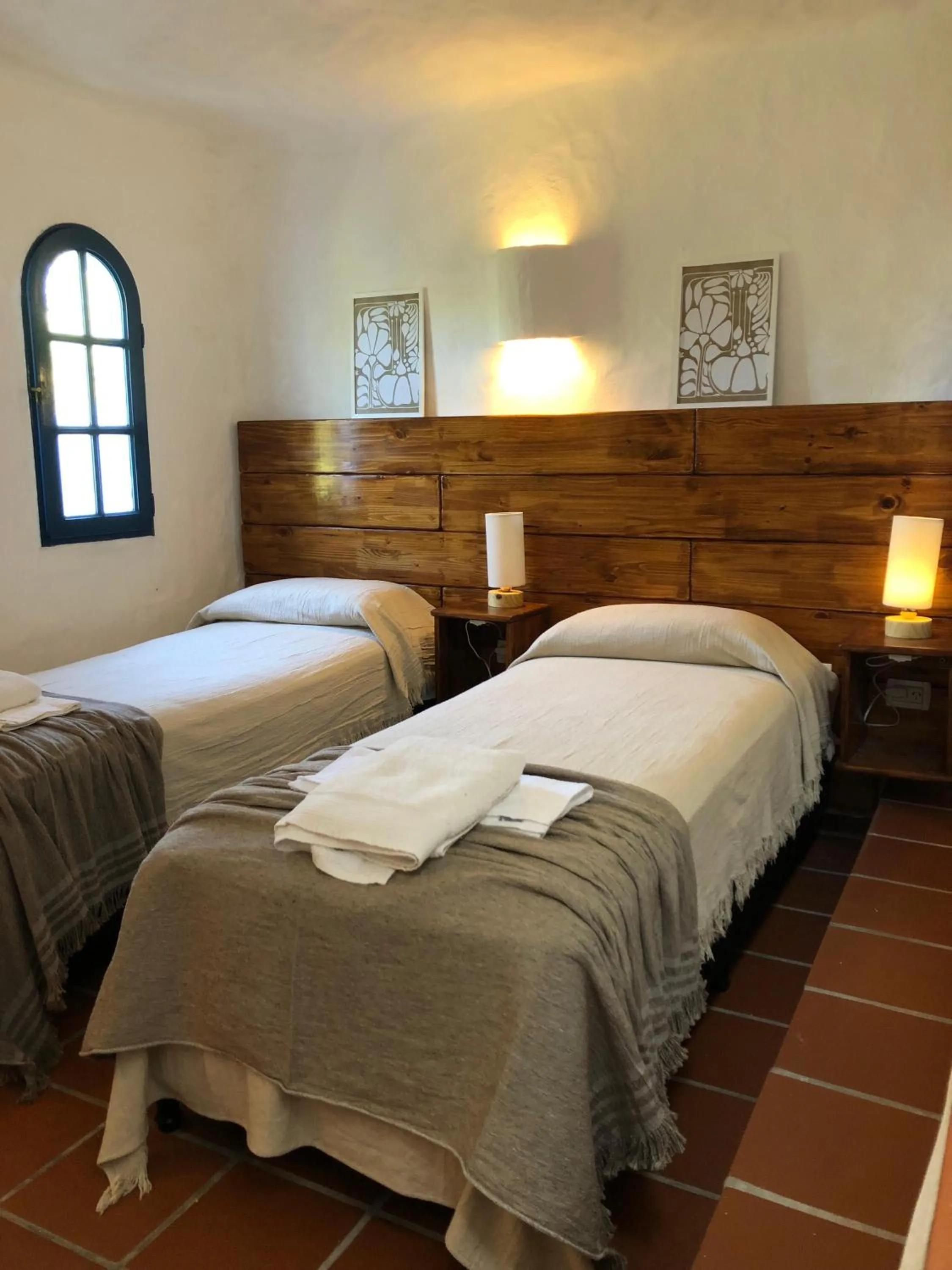 Bed in El Faro de Carpier - ApartHotel & Restaurante Bar Cafetería