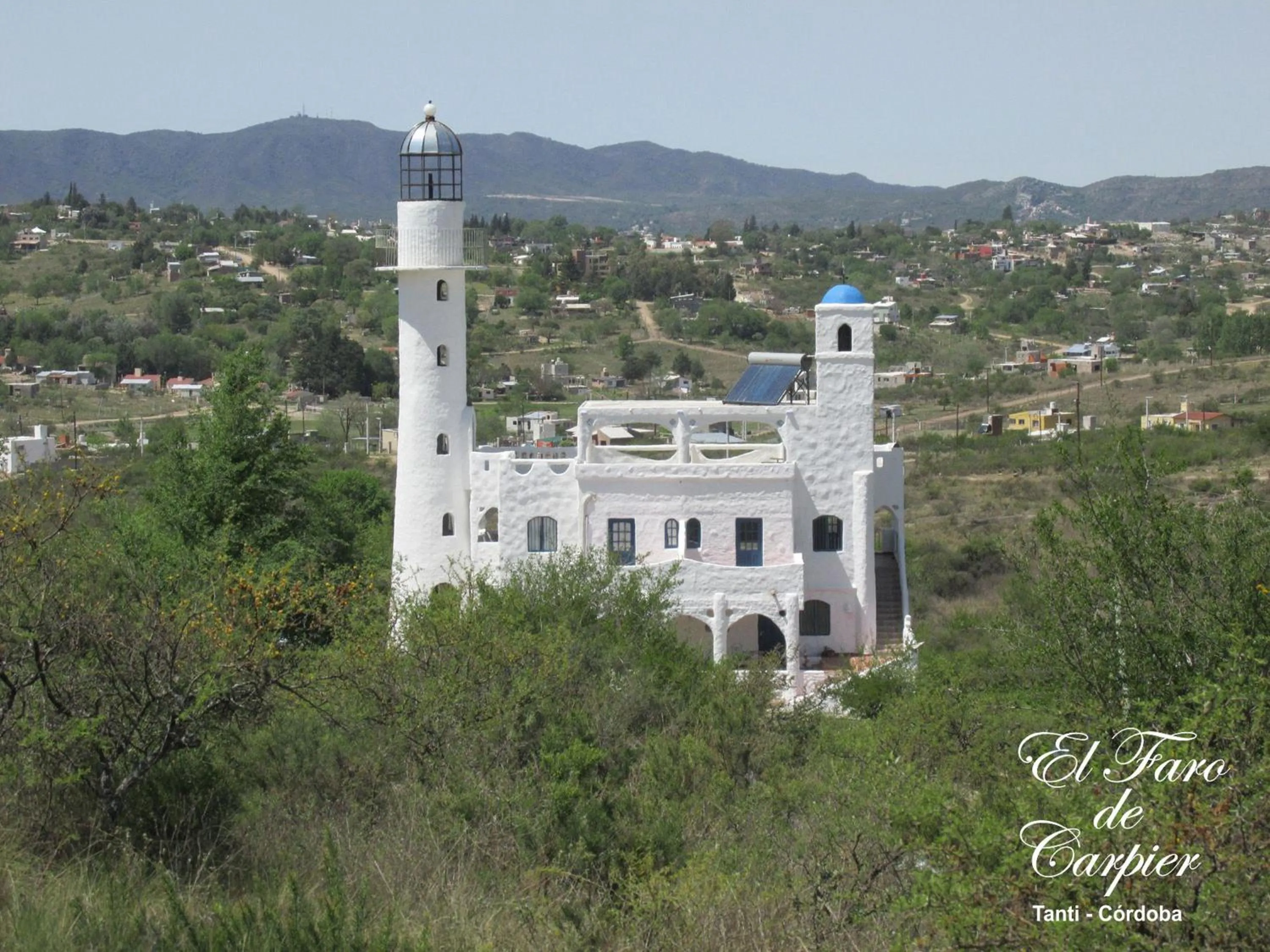 Property building in El Faro de Carpier - ApartHotel & Restaurante Bar Cafetería