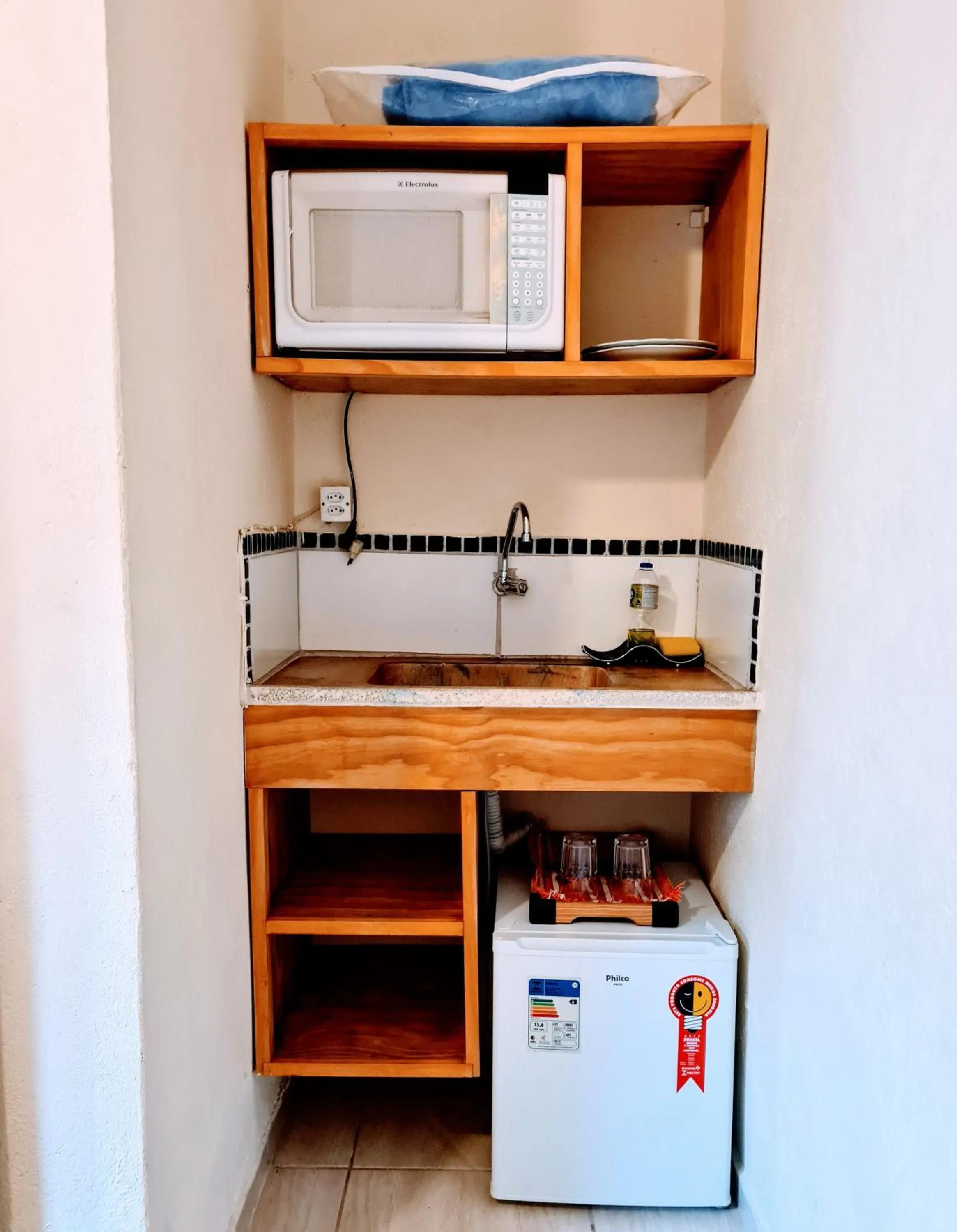 Kitchen or kitchenette in Praia Suítes Itagua Ubatuba