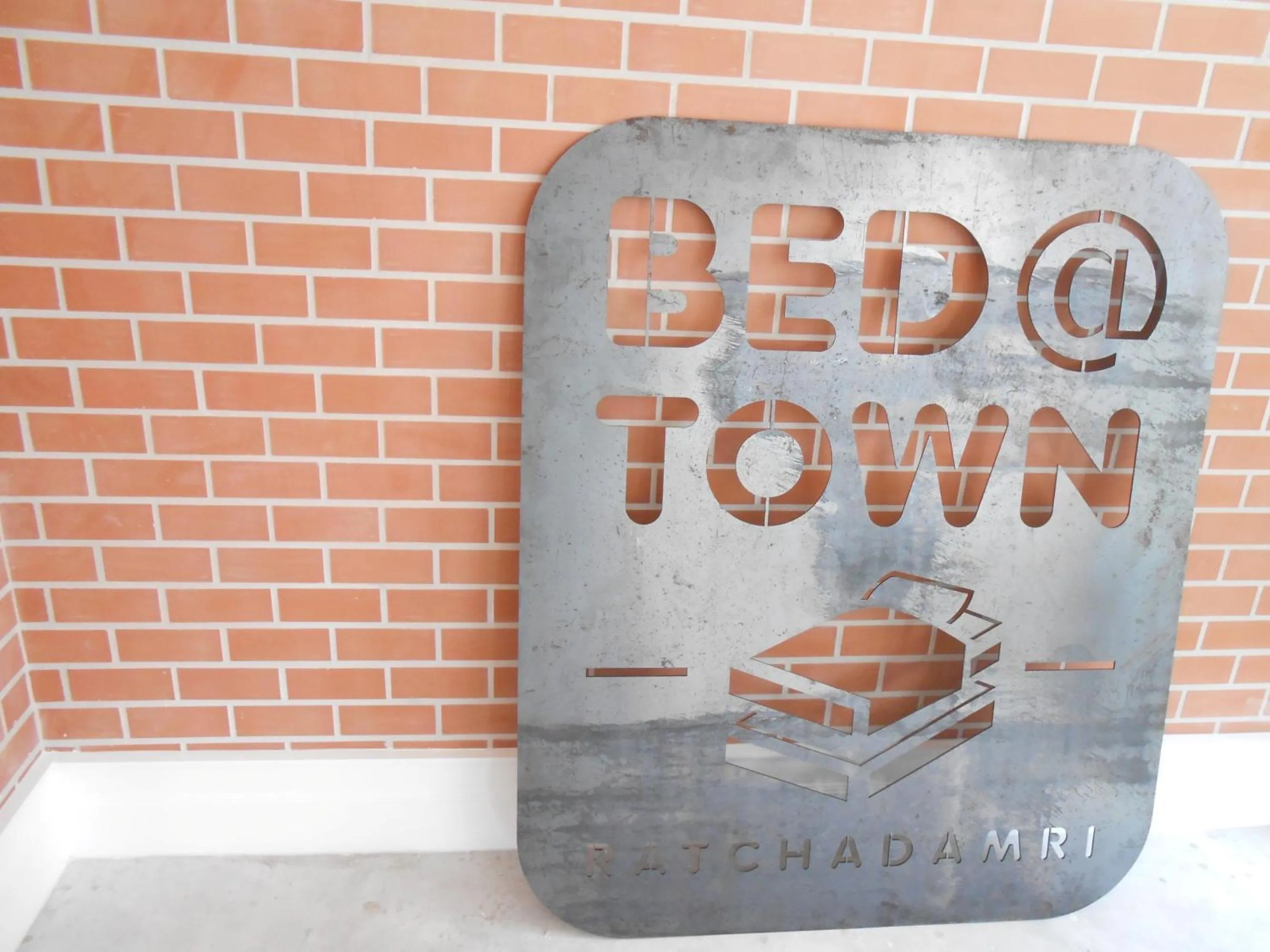 Property logo or sign in Bed@Town Hostel