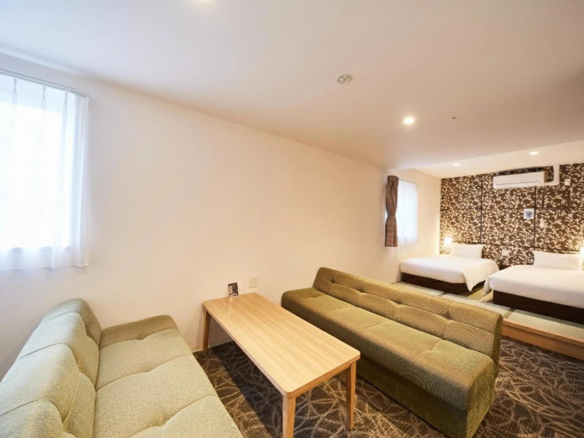 Bed in Sakura Garden Hotel