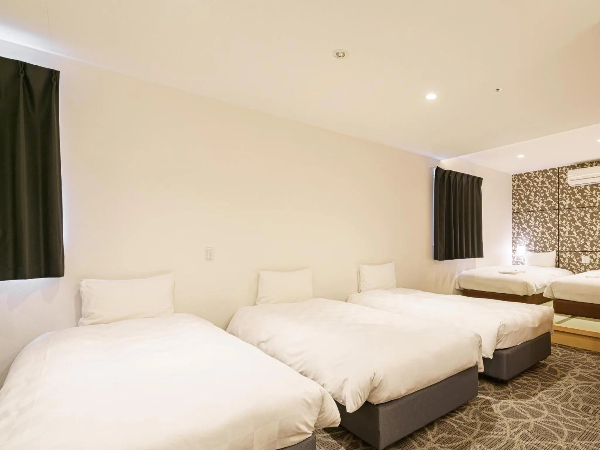 Bed in Sakura Garden Hotel