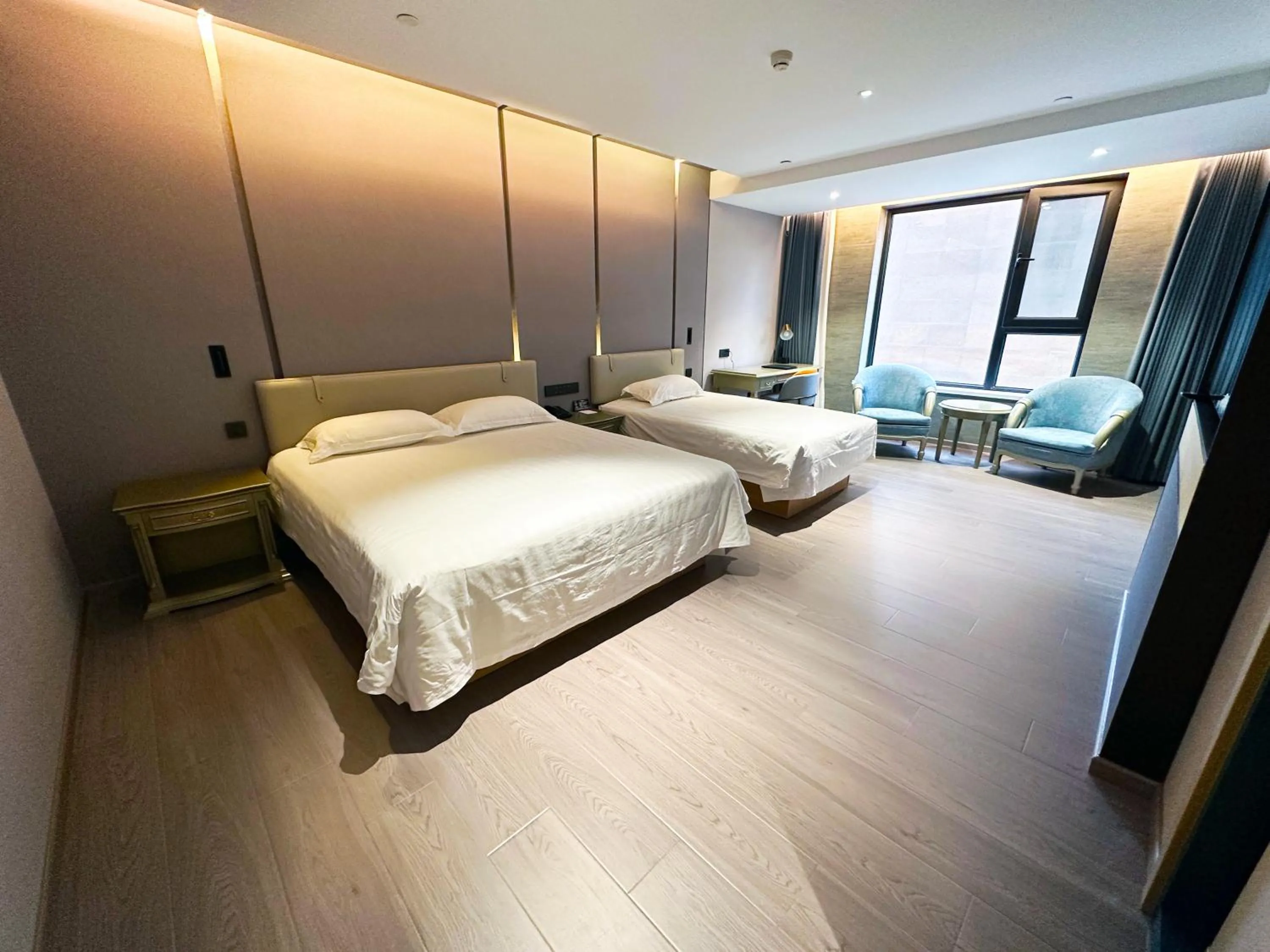 Bed in National Jade Hotel