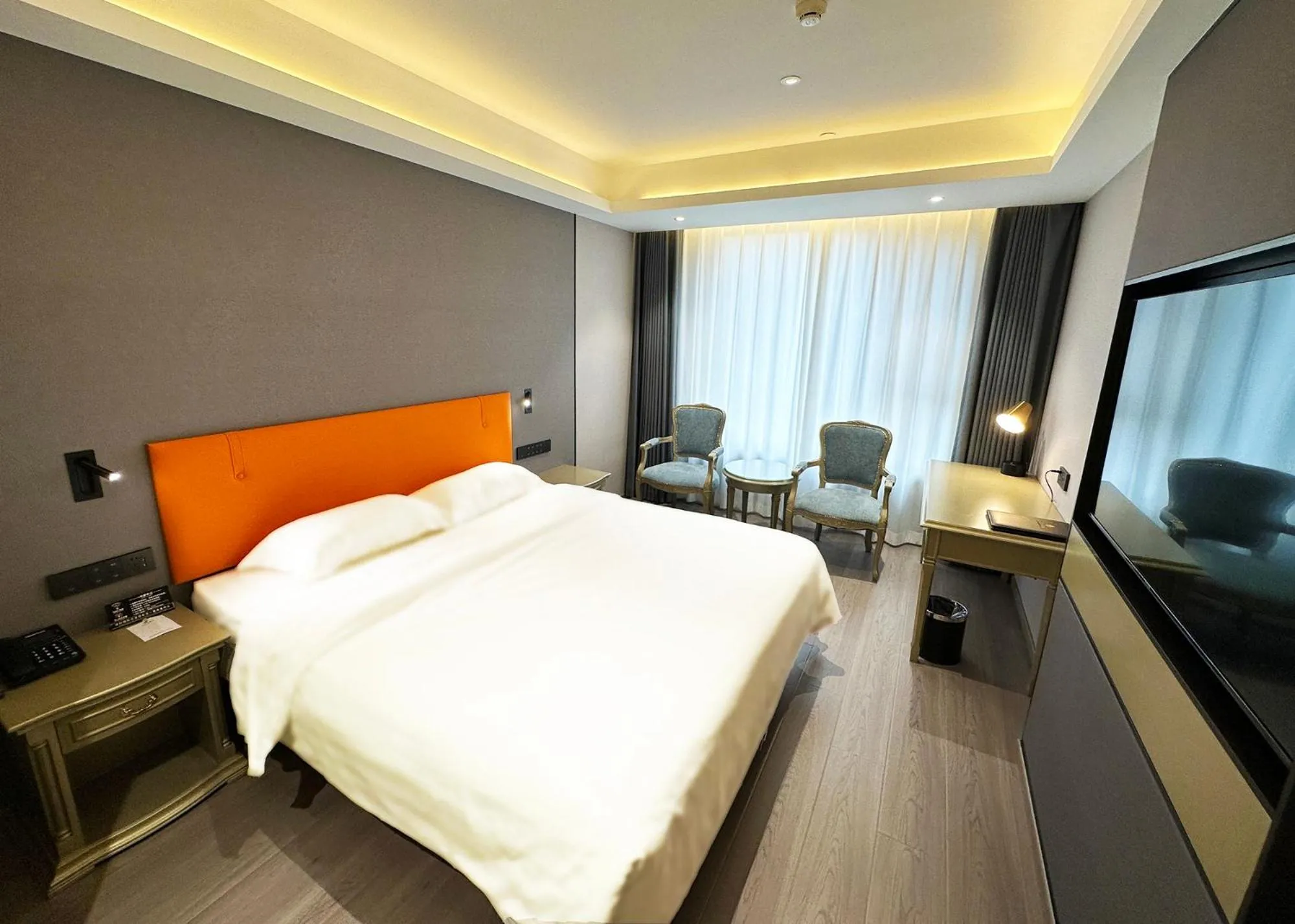 Bed in National Jade Hotel