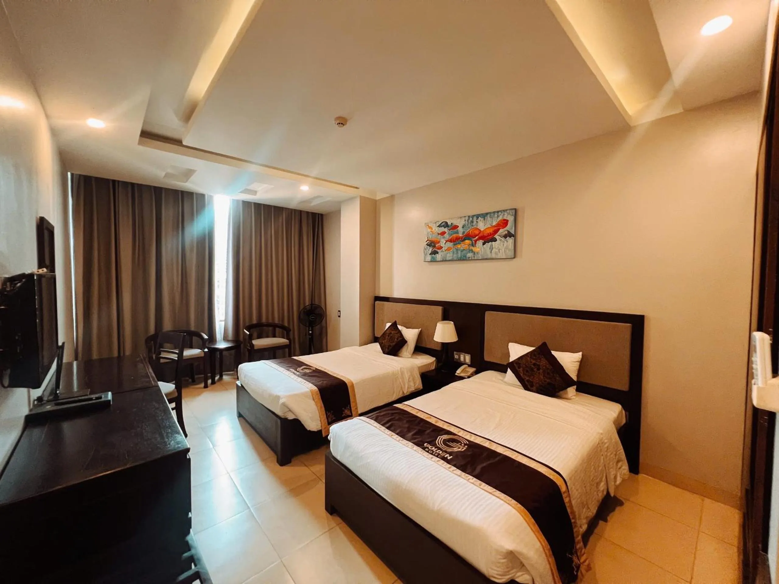 Bed in Golden Quang Tri Hotel