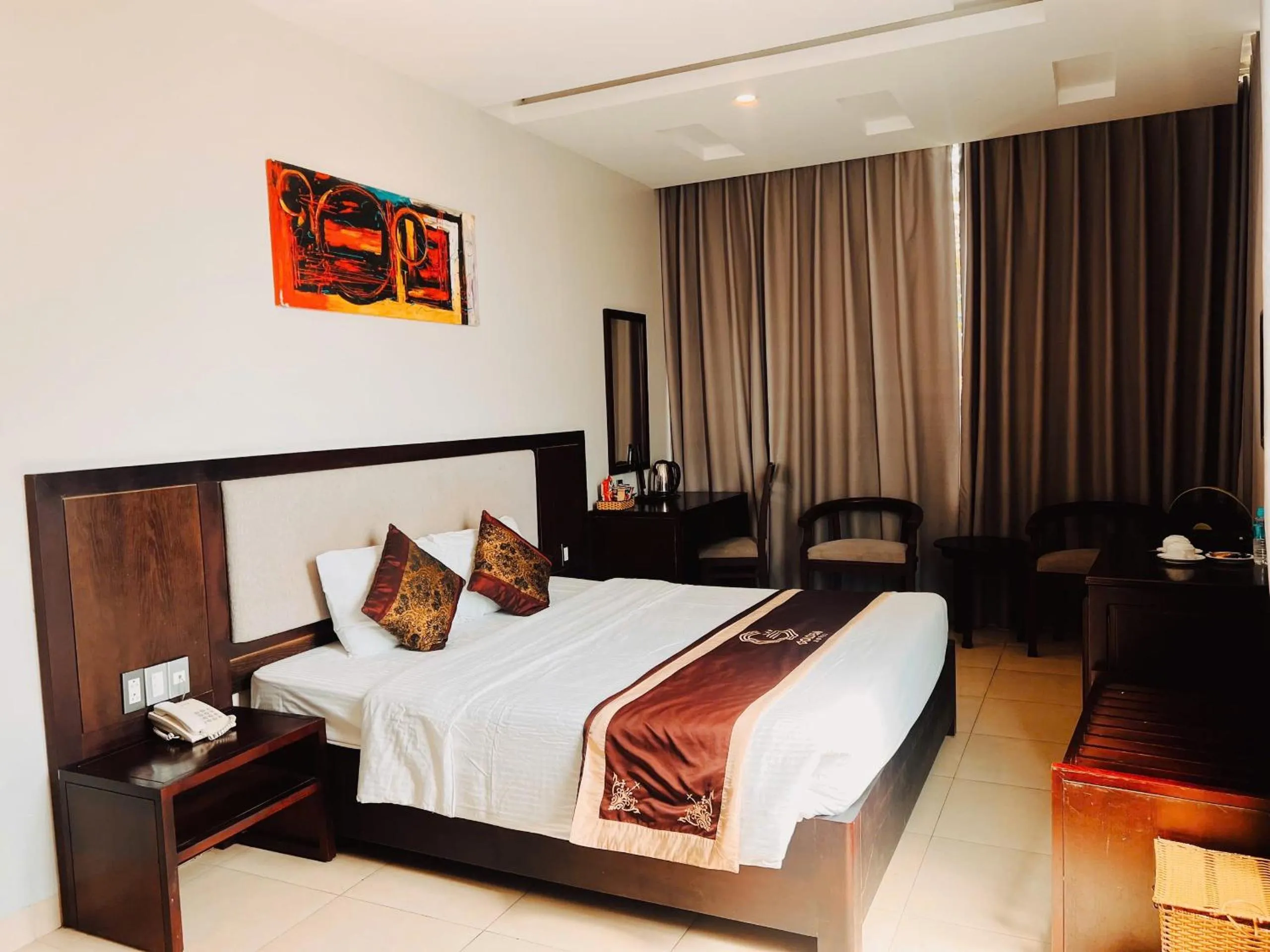 Bed in Golden Quang Tri Hotel