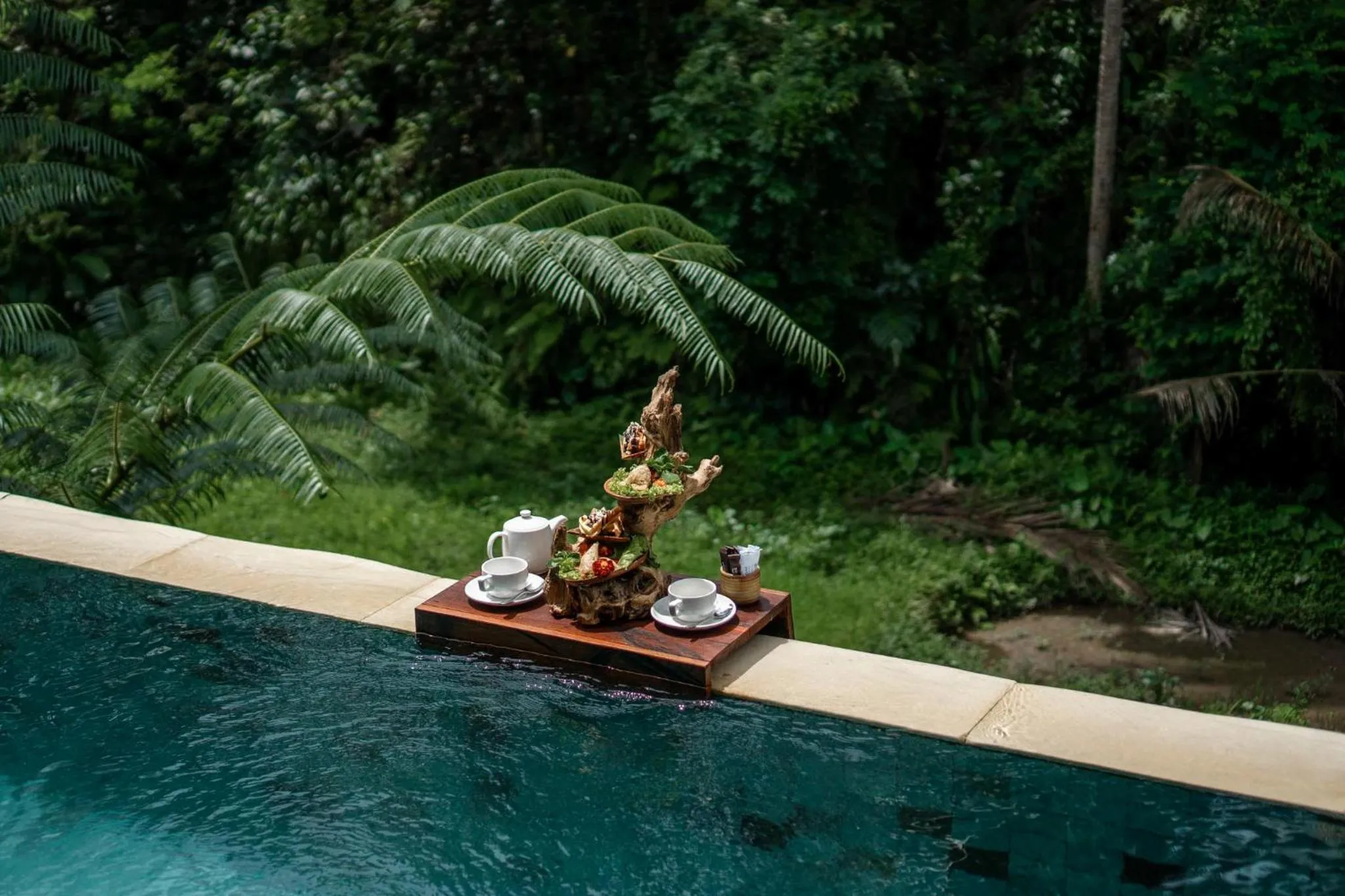Swimming pool in Dedary Resort & Spa Ubud by Ini Vie Hospitality