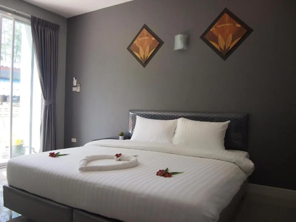 Bed in MJ Boutique Hotel Khao Lak