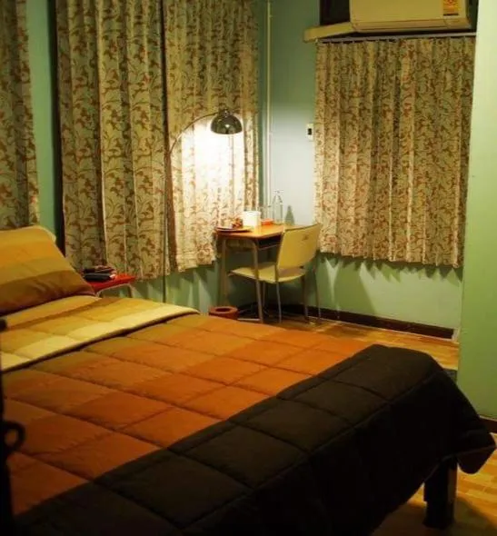 Bed in Chommuang Guest House