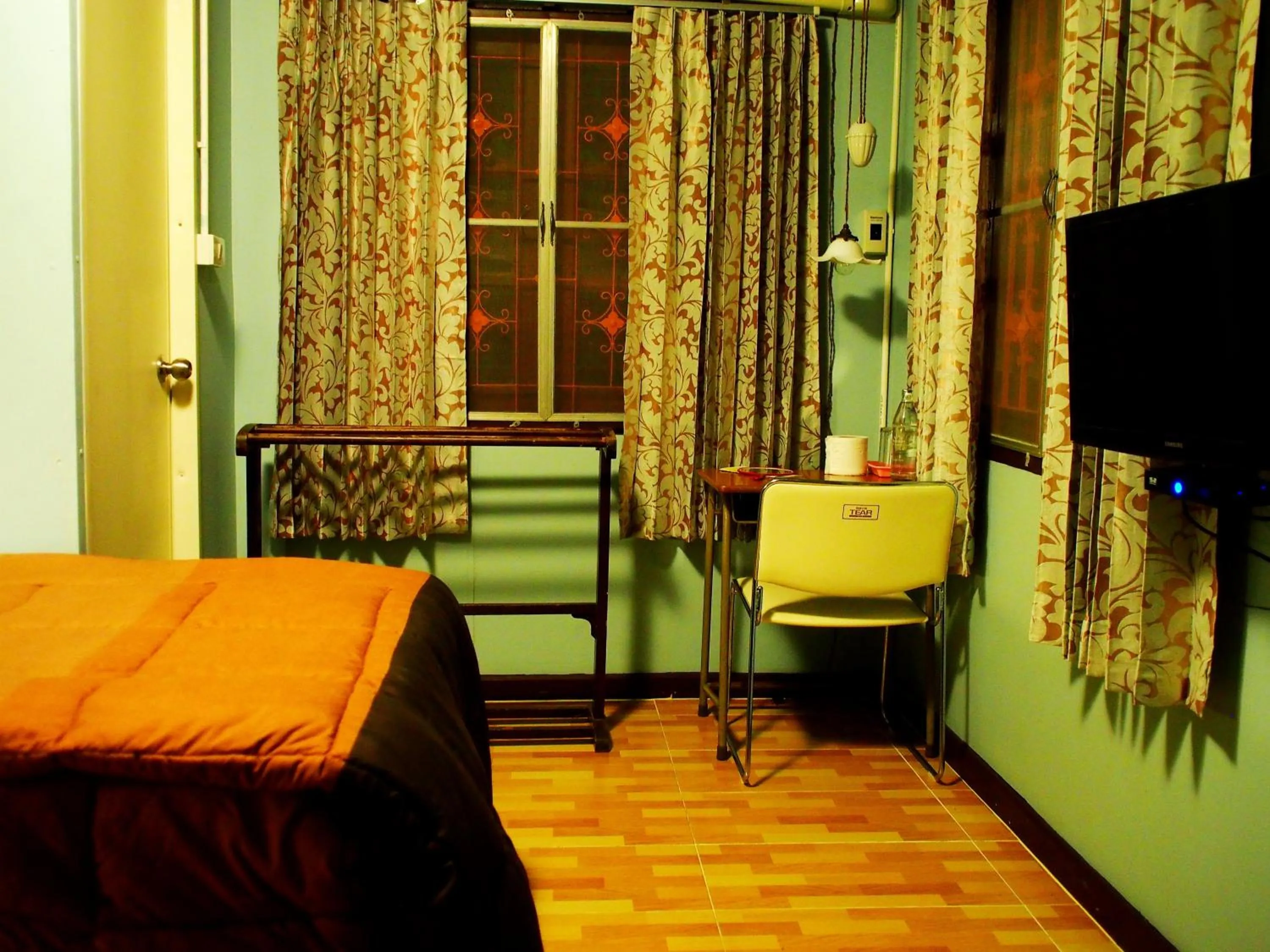 Bed in Chommuang Guest House