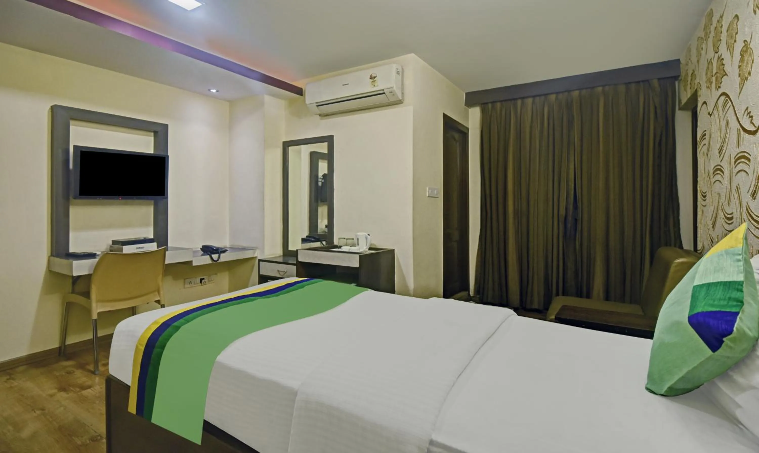 Bedroom, Bed in Treebo Savoury Sea Shell Residency