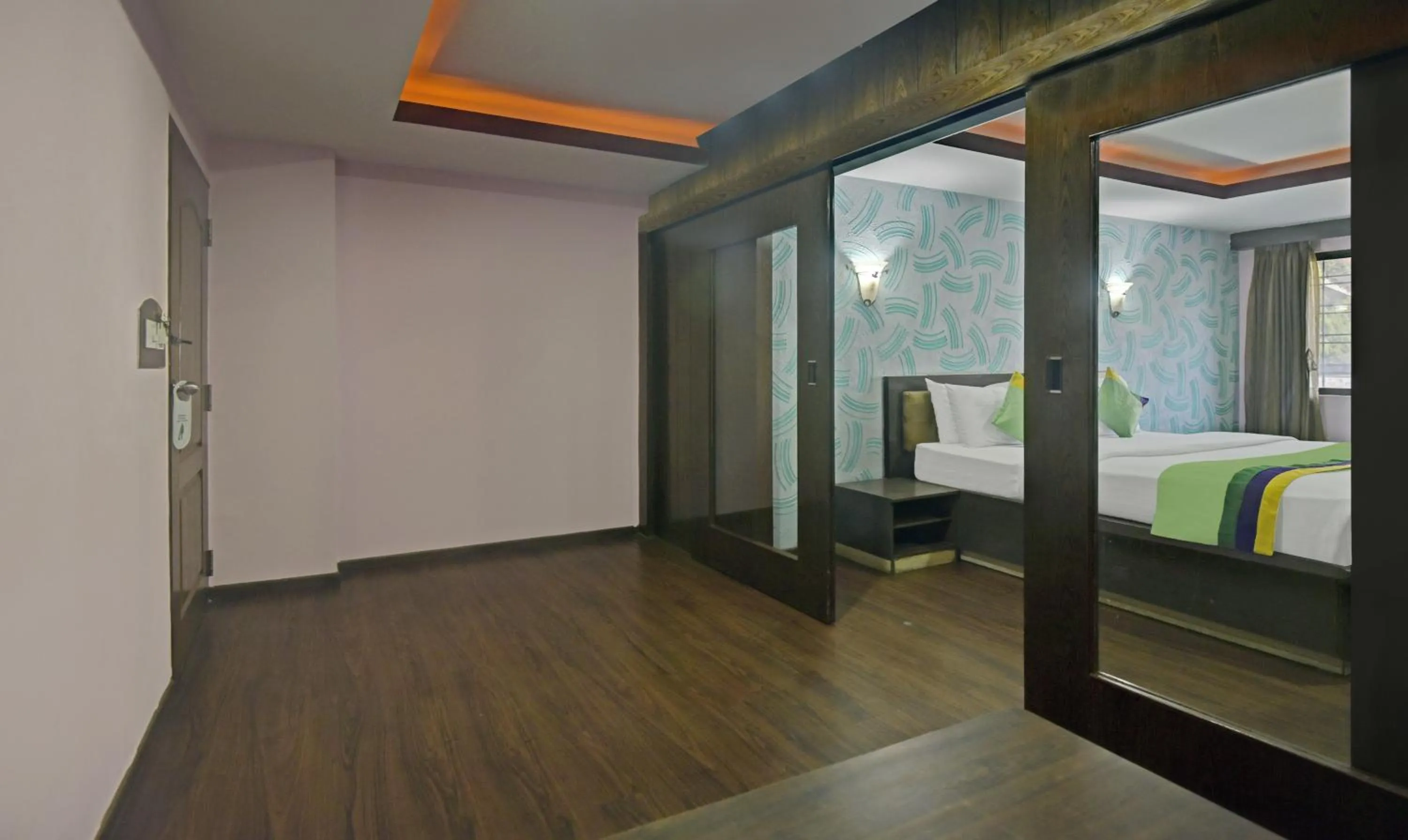 Bedroom, Bed in Treebo Savoury Sea Shell Residency