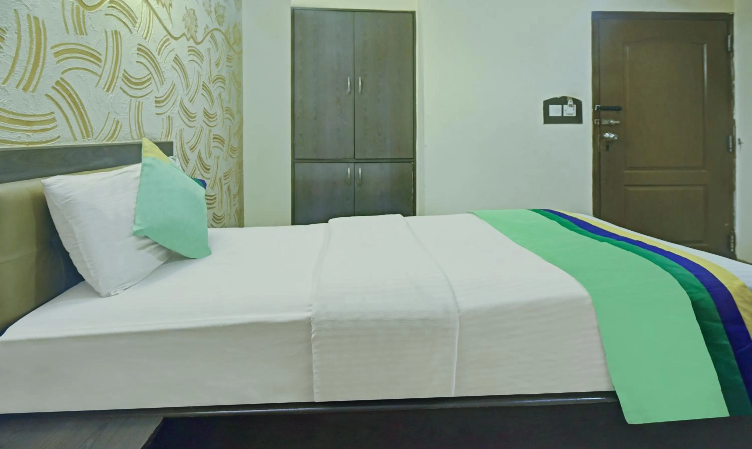 Bedroom, Bed in Treebo Savoury Sea Shell Residency