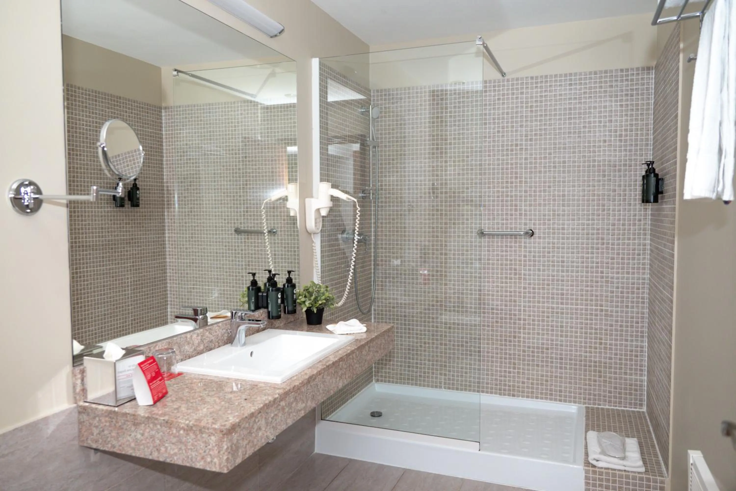 Bathroom in Ramada Plaza by Wyndham Craiova