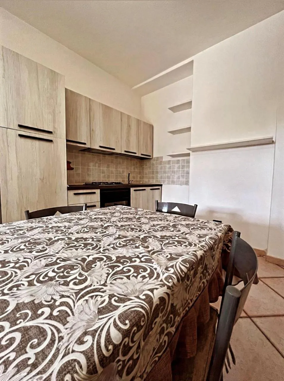 Kitchen or kitchenette in Case Vacanze Le Buganville