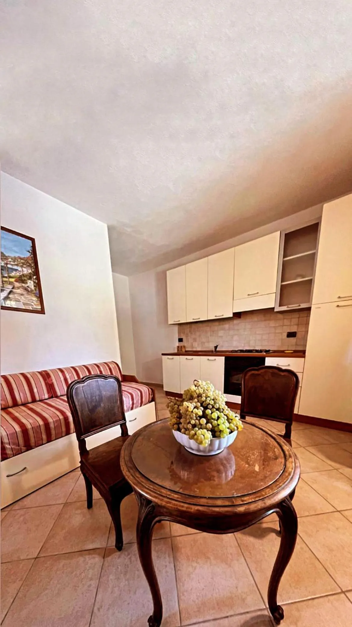 Kitchen or kitchenette in Case Vacanze Le Buganville