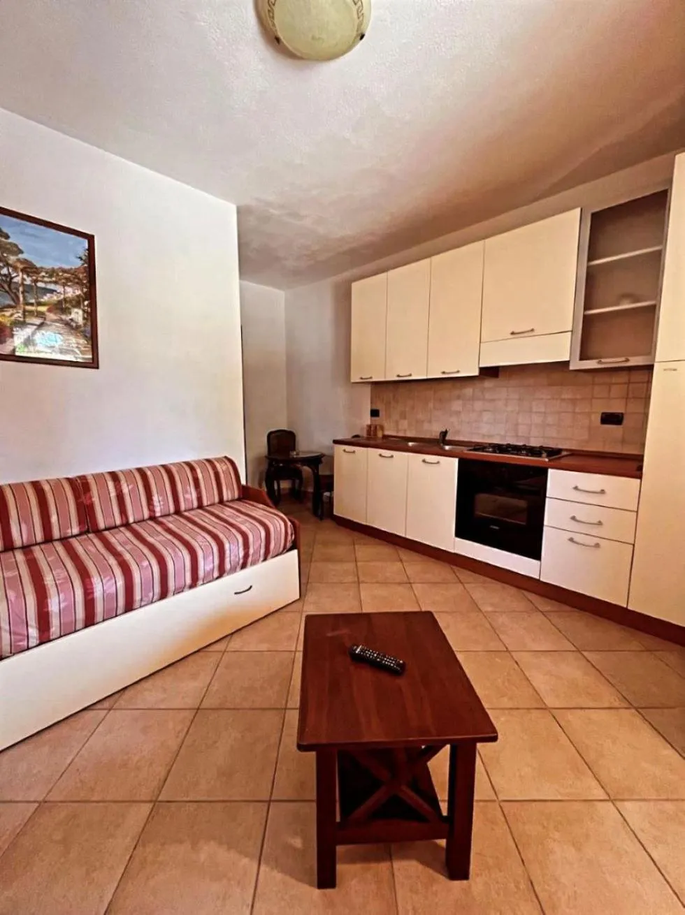 Kitchen or kitchenette in Case Vacanze Le Buganville