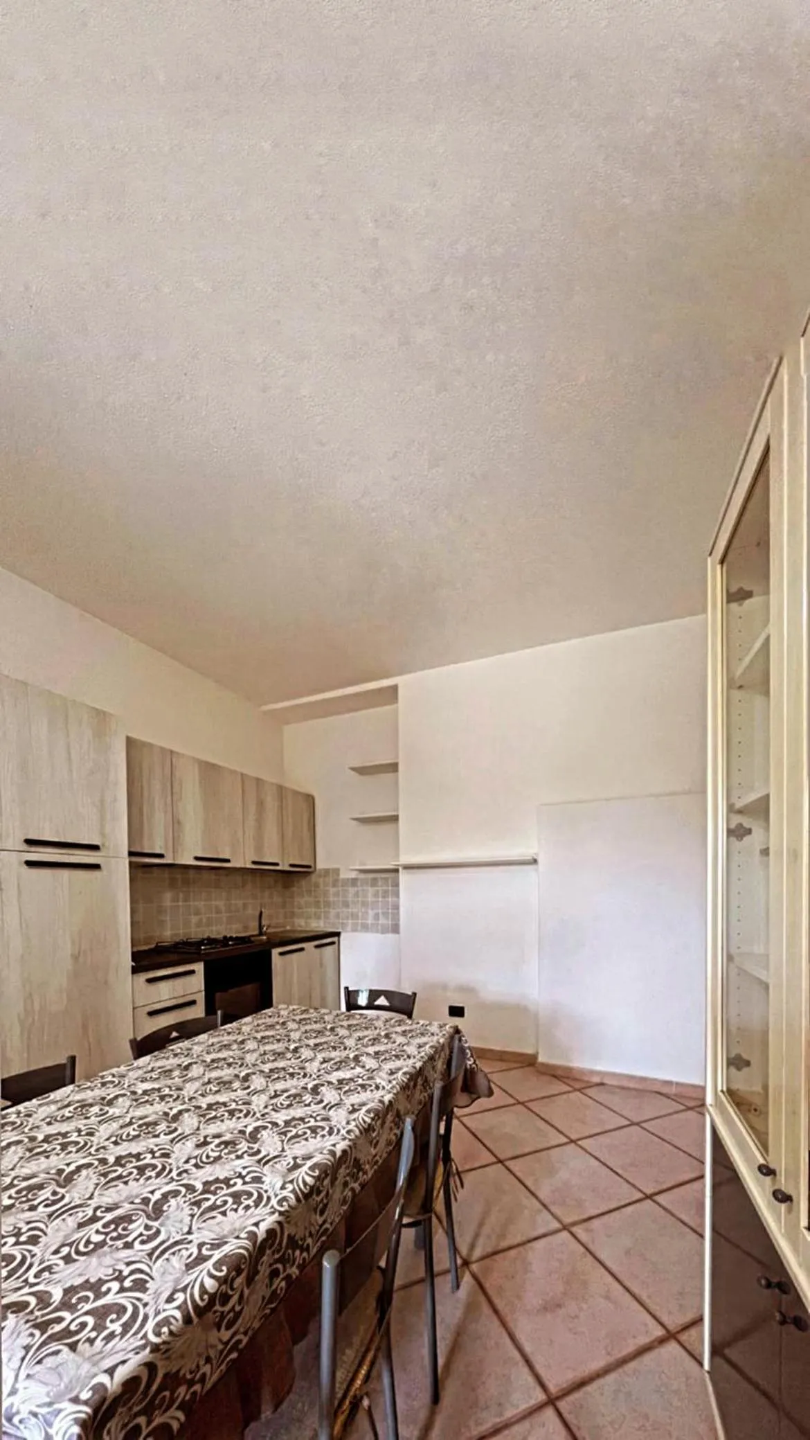 Kitchen or kitchenette in Case Vacanze Le Buganville