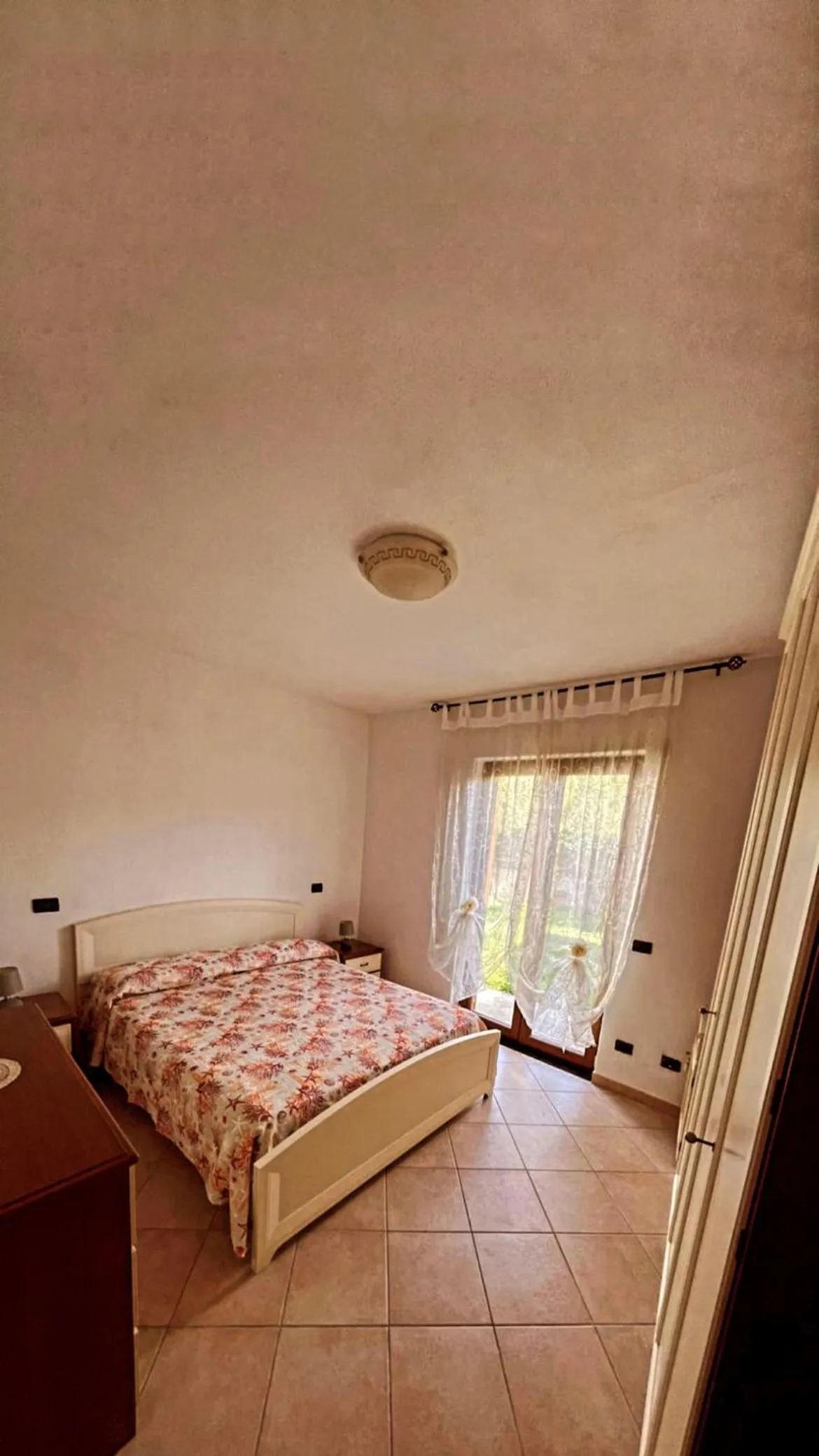 Photo of the whole room in Case Vacanze Le Buganville