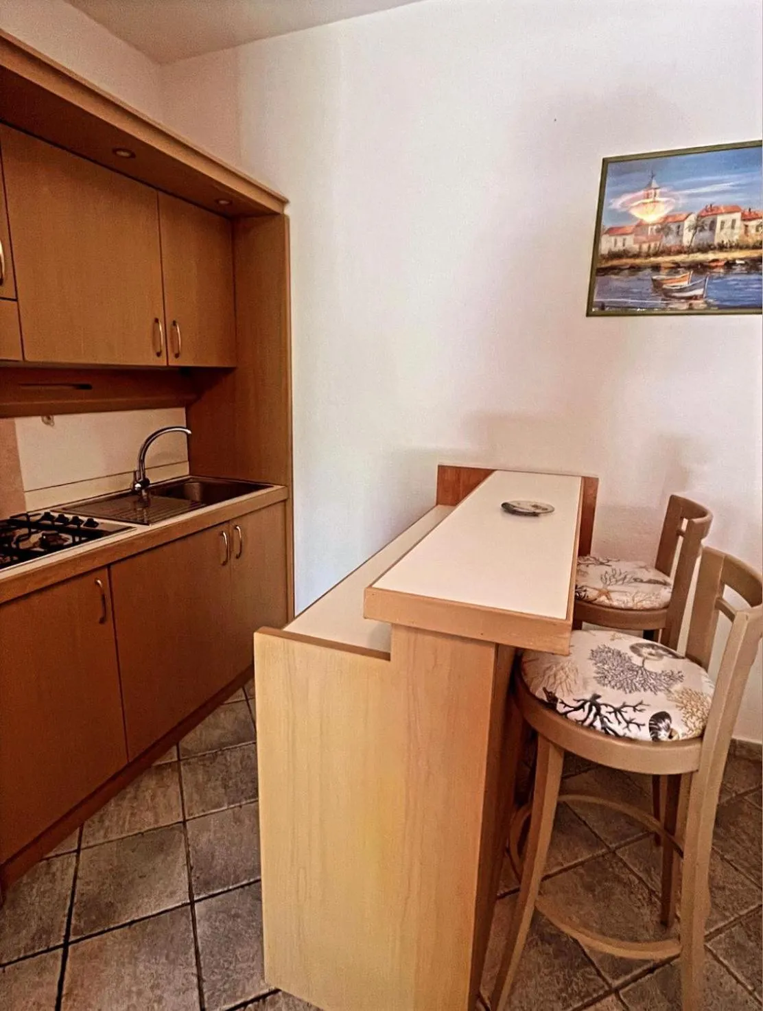 Kitchen or kitchenette in Case Vacanze Le Buganville