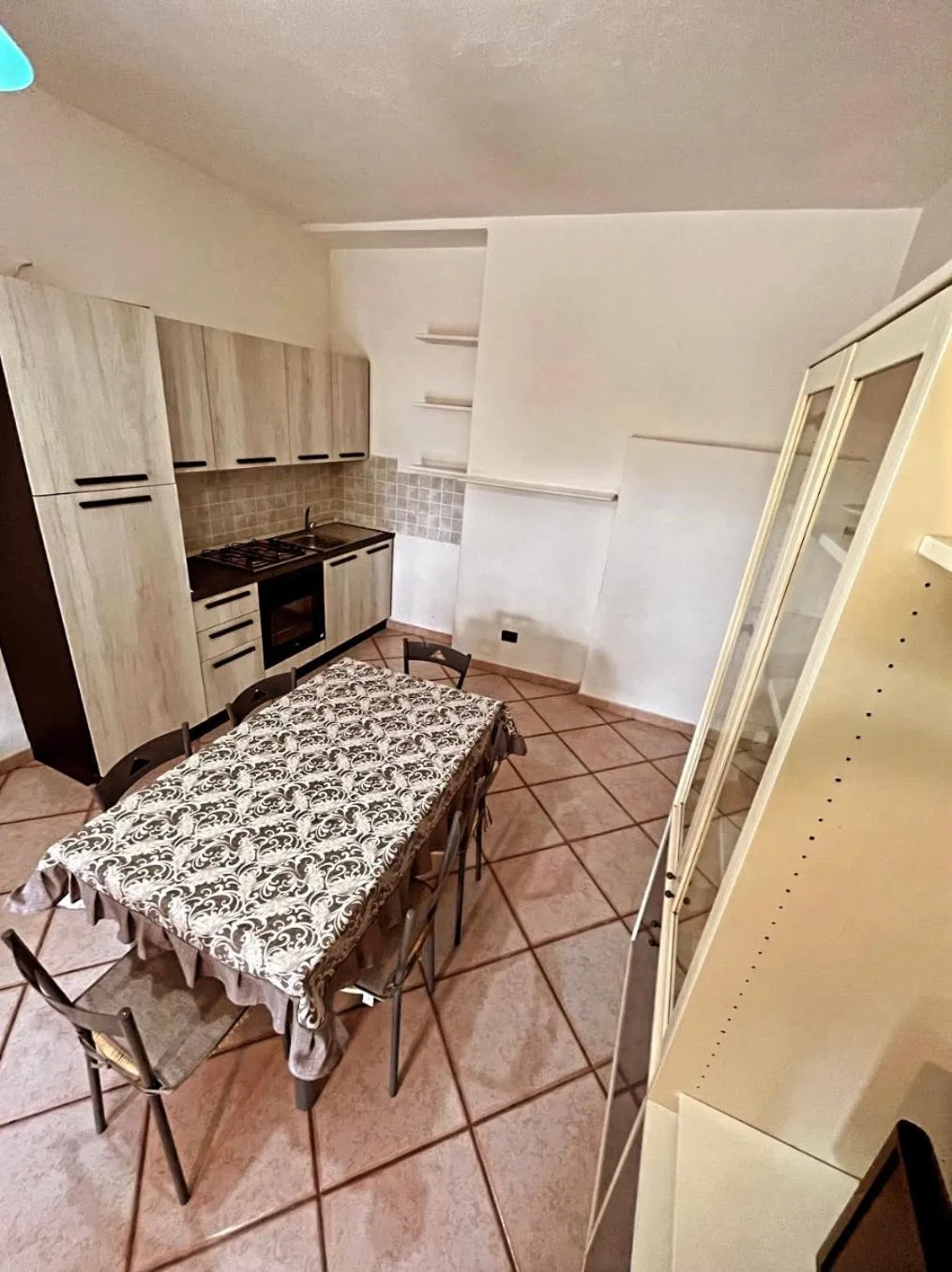 Kitchen or kitchenette in Case Vacanze Le Buganville