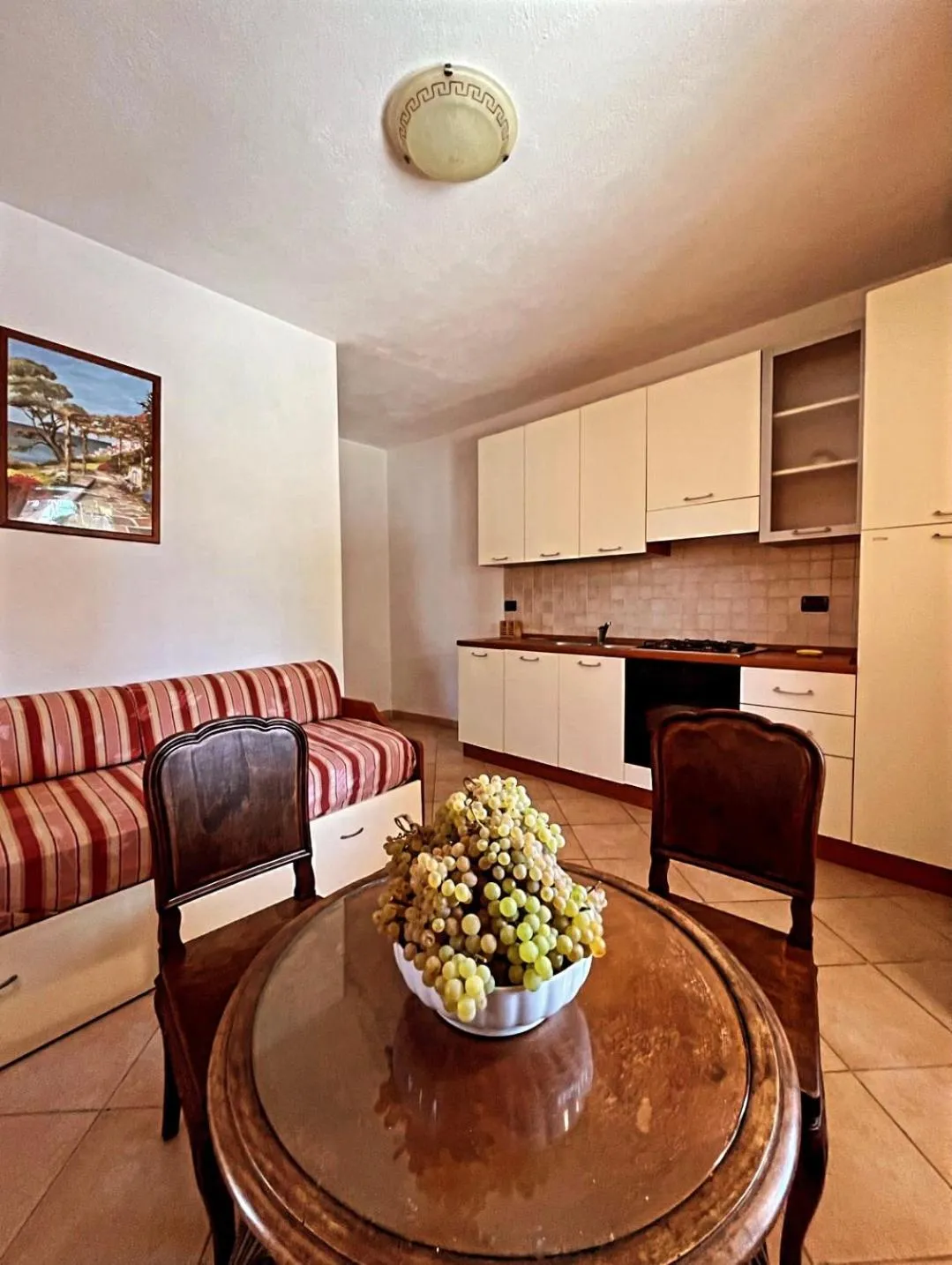 Kitchen or kitchenette in Case Vacanze Le Buganville