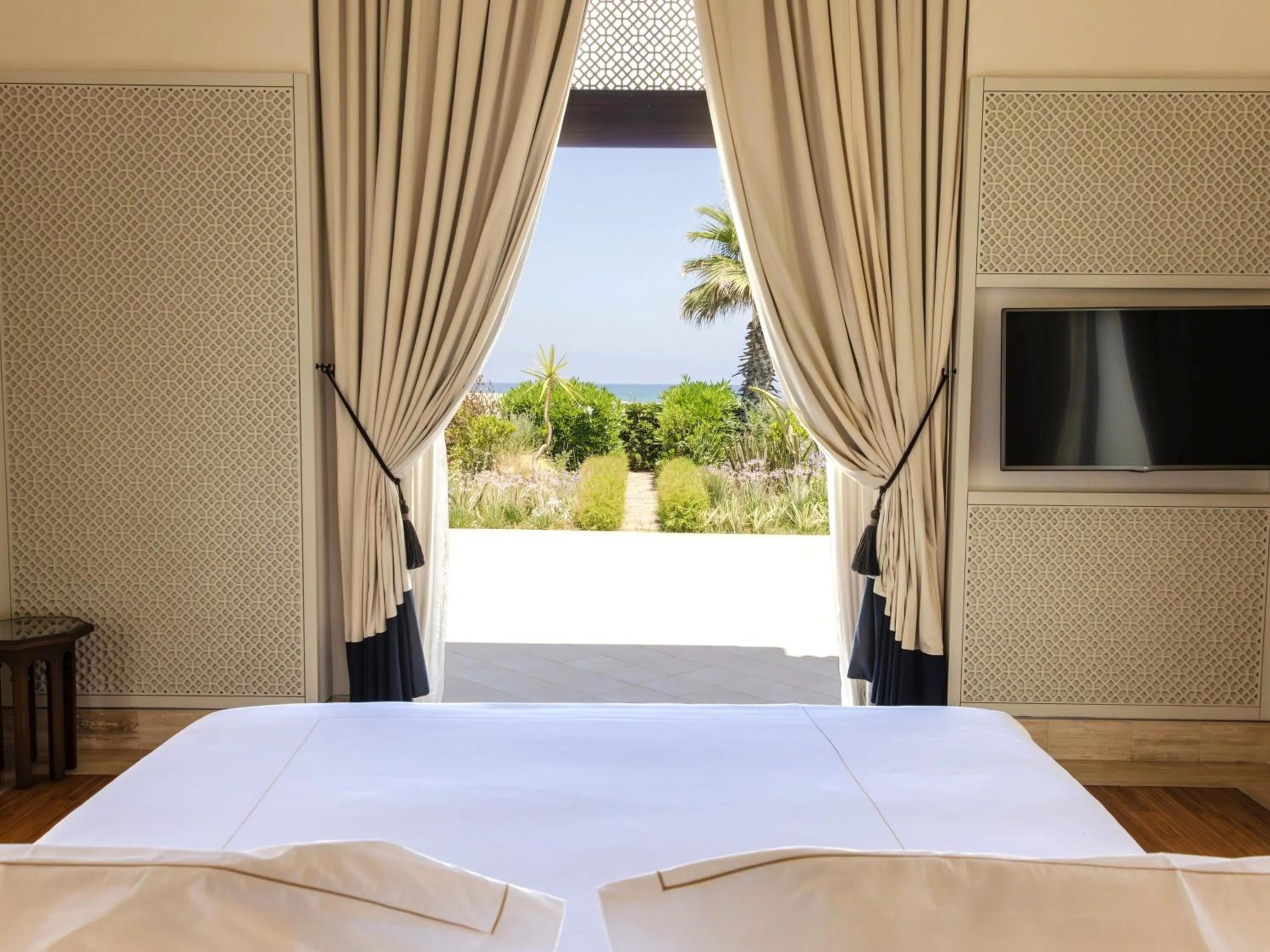 View (from property/room), Bed in Banyan Tree Tamouda Bay