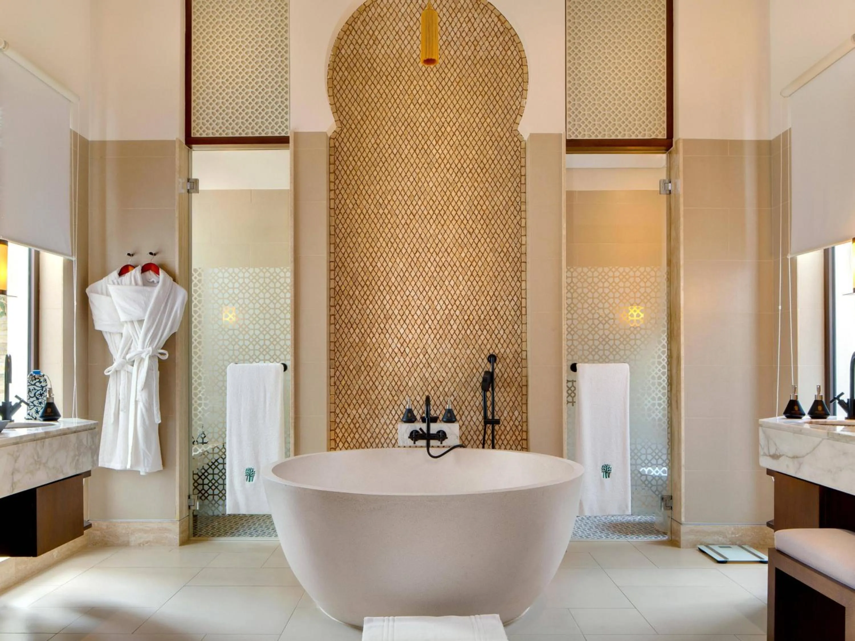 Shower, Bed in Banyan Tree Tamouda Bay