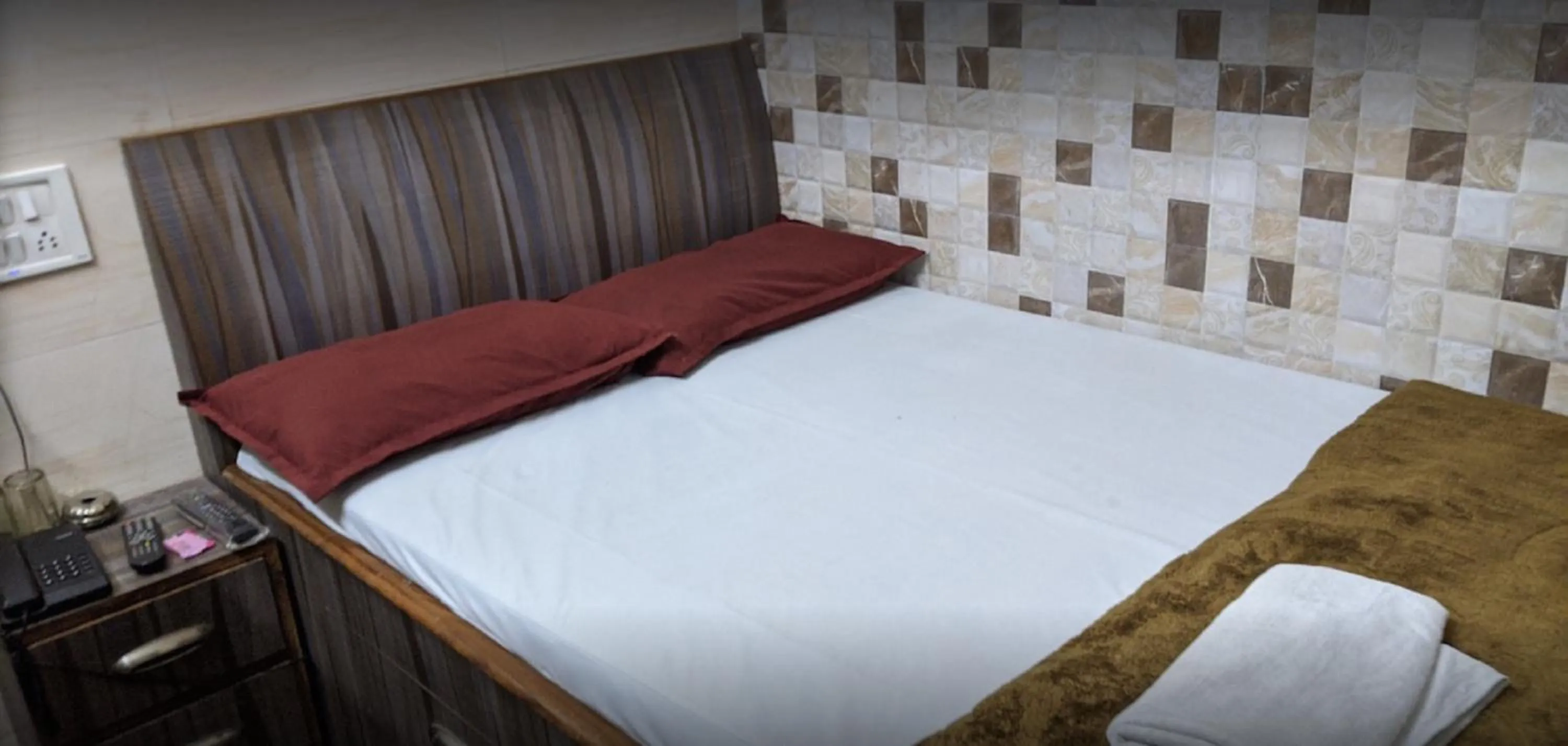 Bedroom, Bed in Ajanta Hotel 100 Mtrs Railway Station & 400 Mtrs Dargah