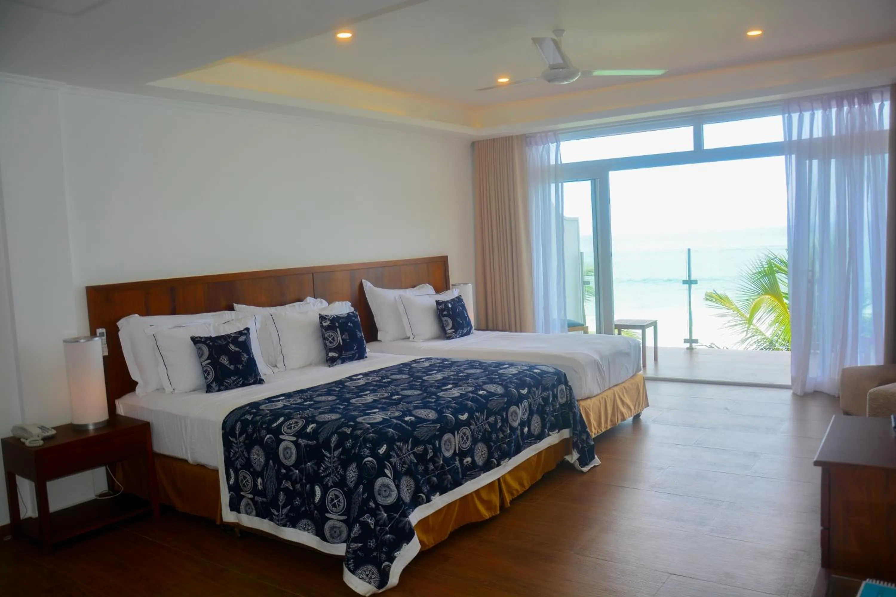Bed in Sayura Beach Hotel