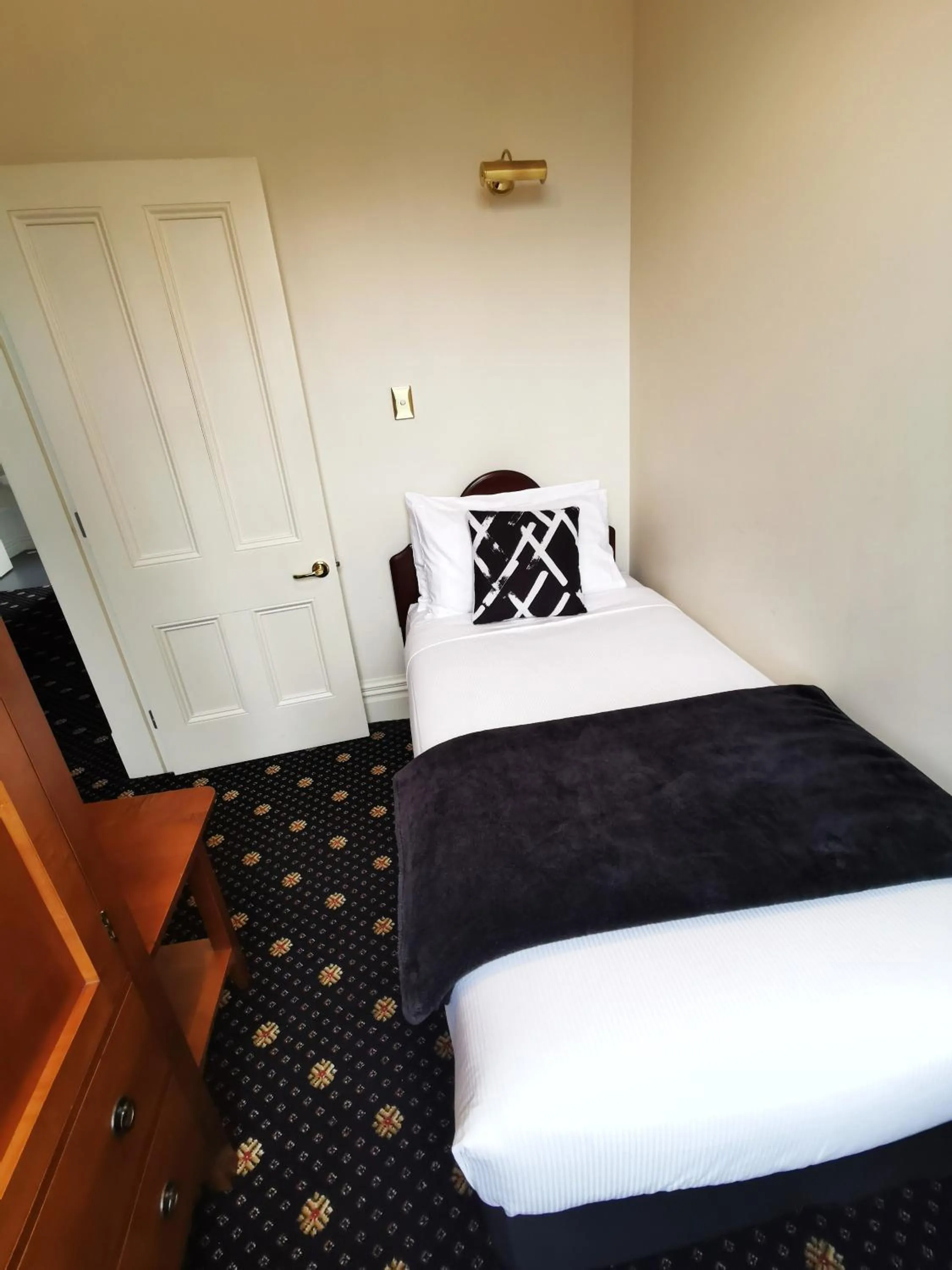 Bed in Highland House Boutique Hotel