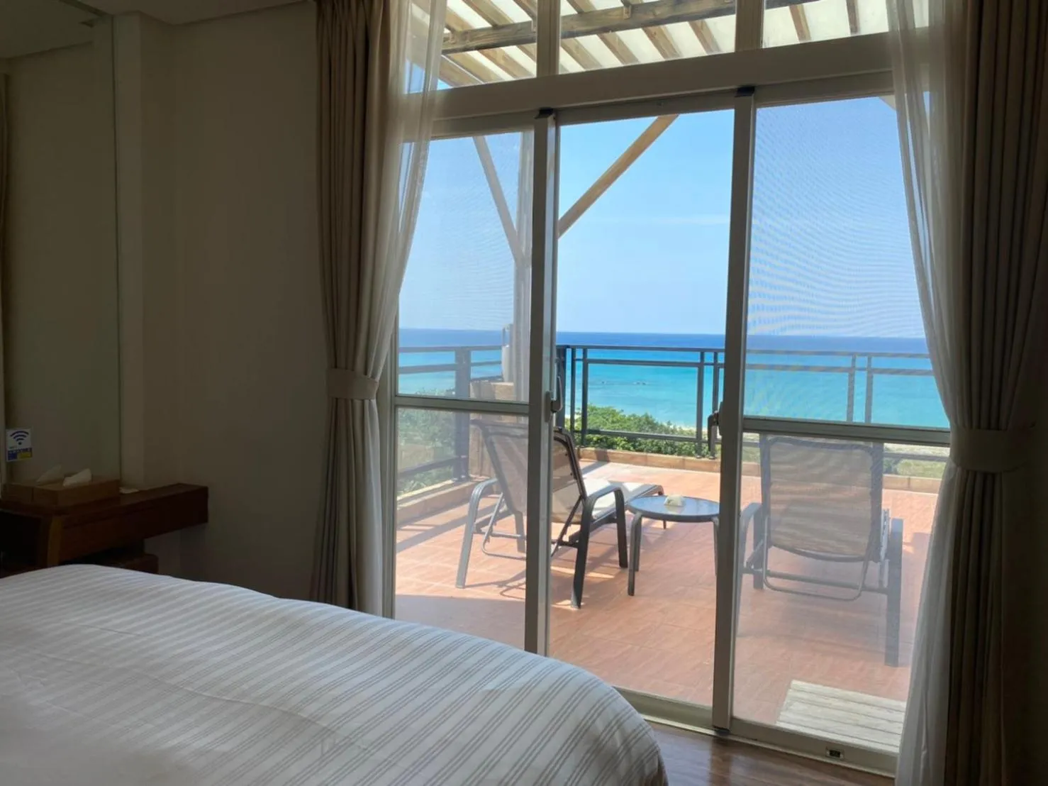 Balcony/Terrace, Bed in LoveSea 126 Beach Inn