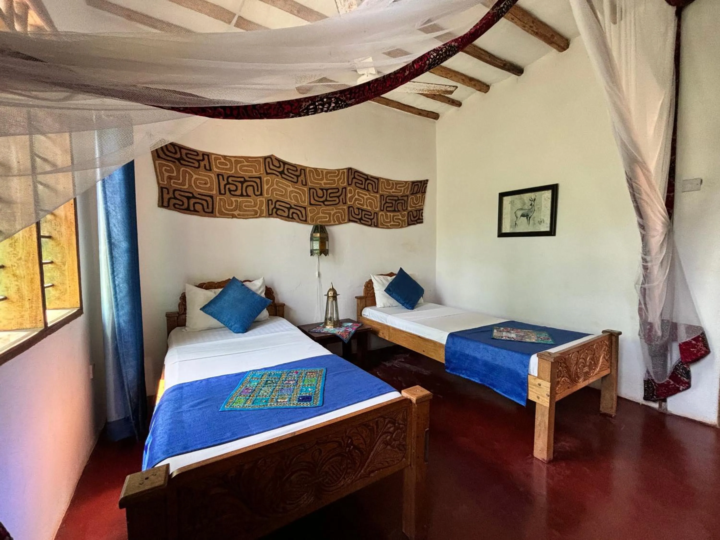 Bed in Sawa Sawa Beach House