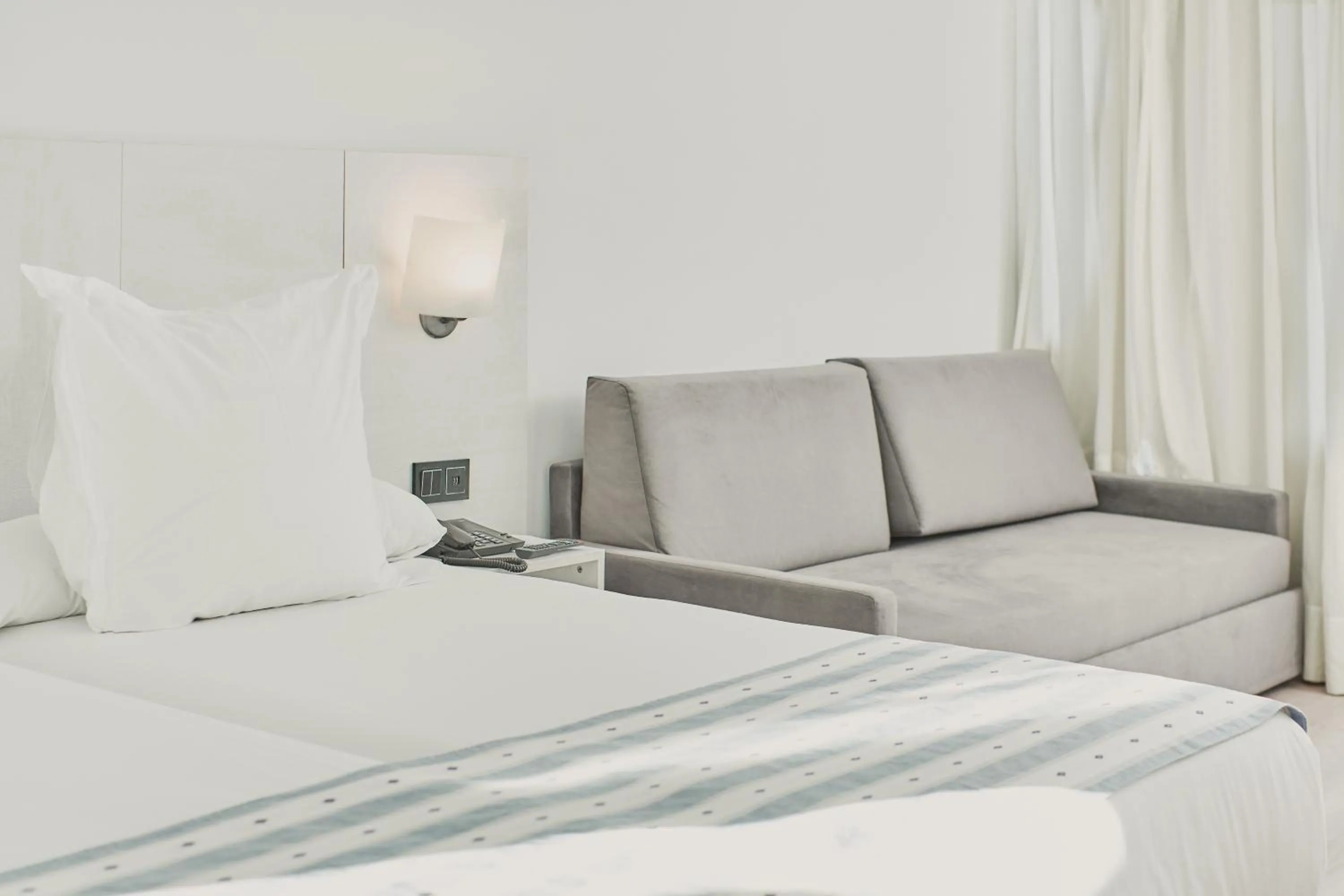 Bed in Gloria Palace San Agustín Thalasso & Hotel