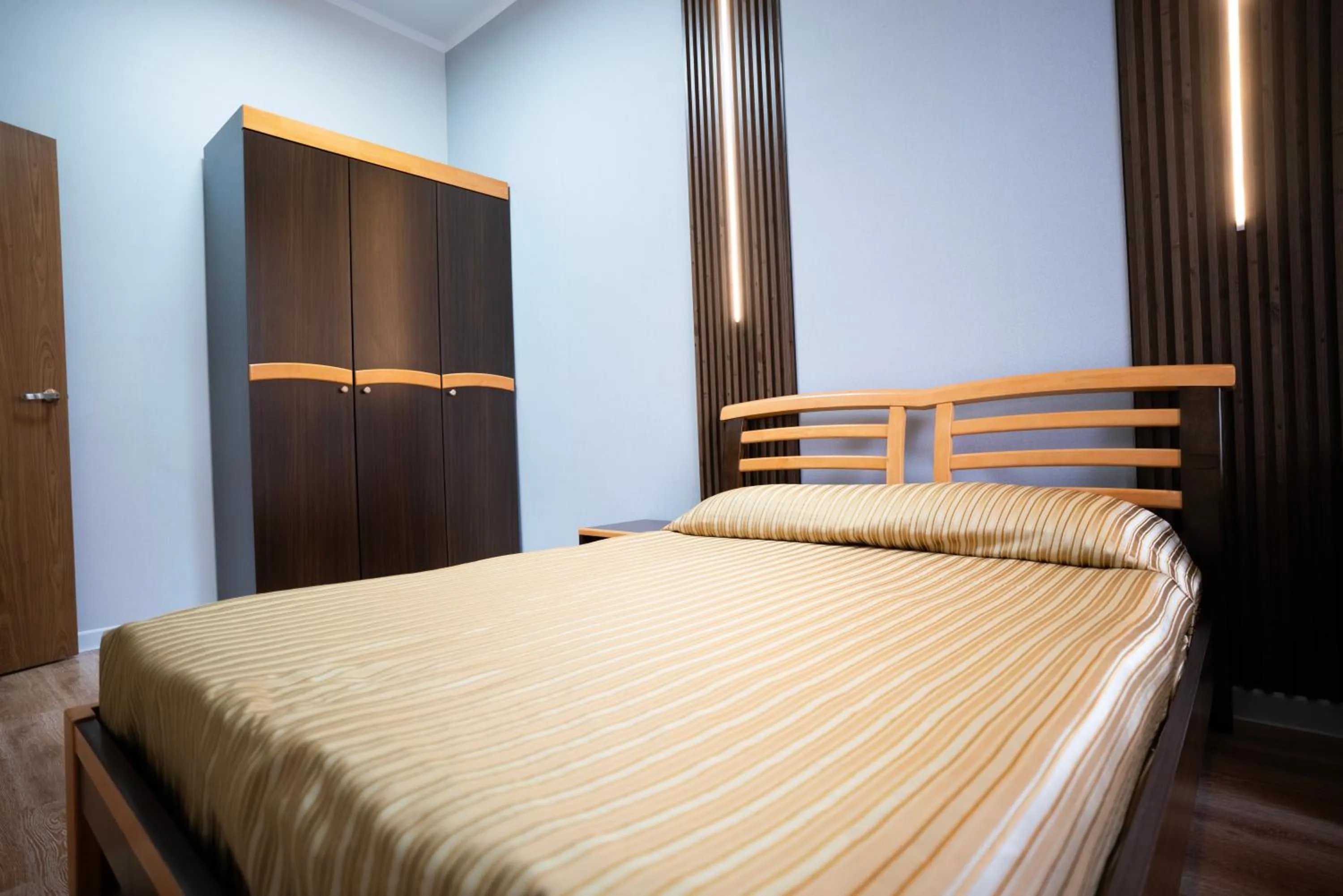 Bed in Tsolmon's Serviced Apartments