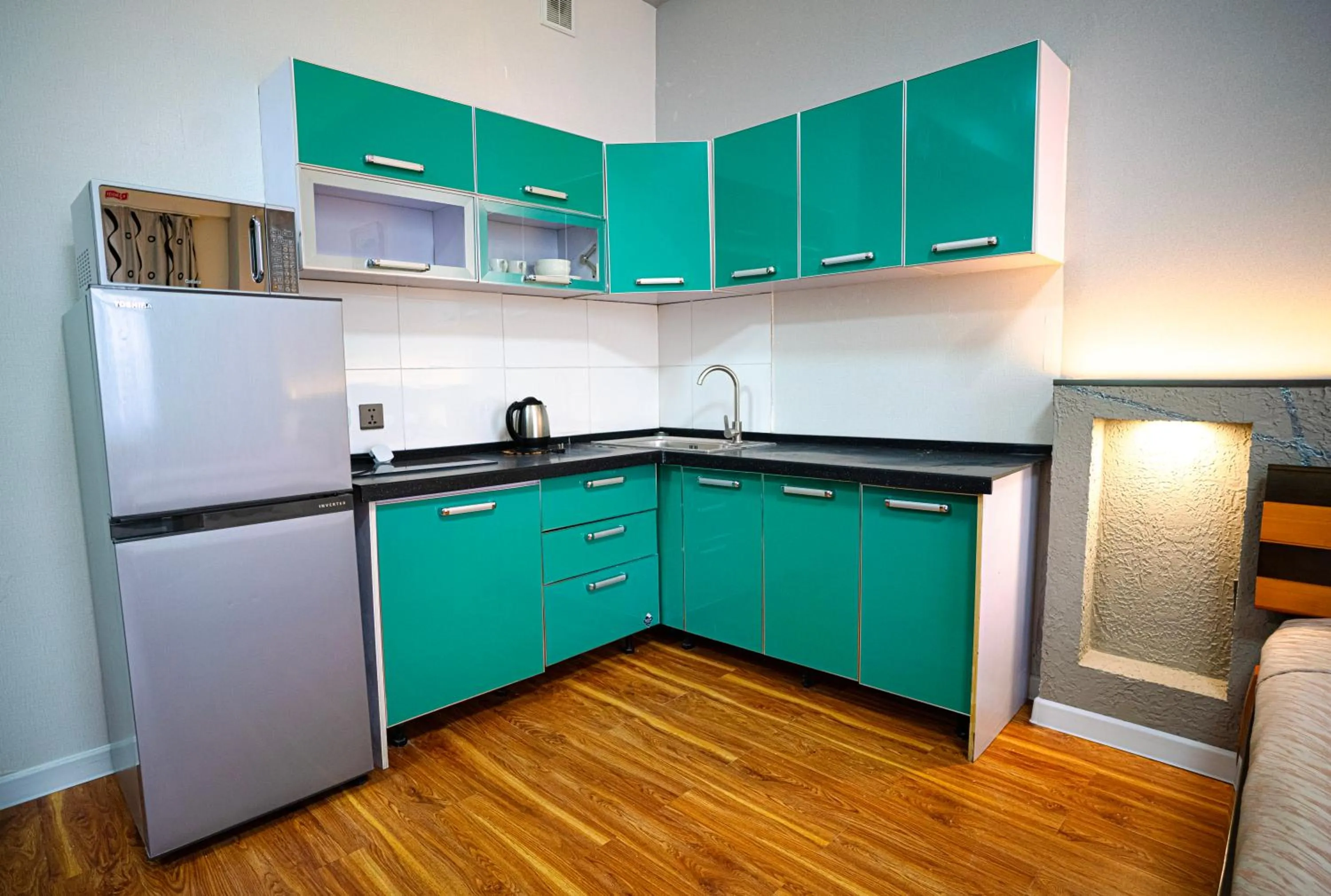 Kitchen or kitchenette in Tsolmon's Serviced Apartments
